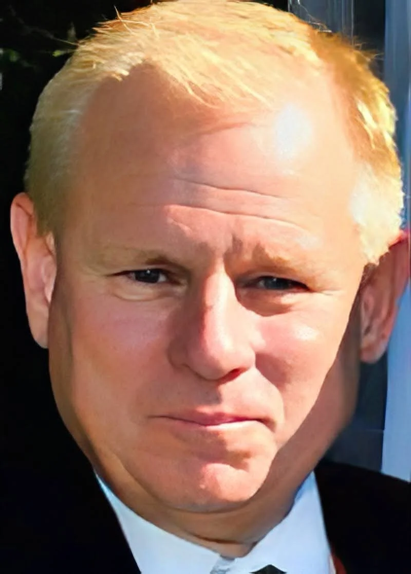 AI-generated portrait of a man with short blonde hair and a neutral expression.