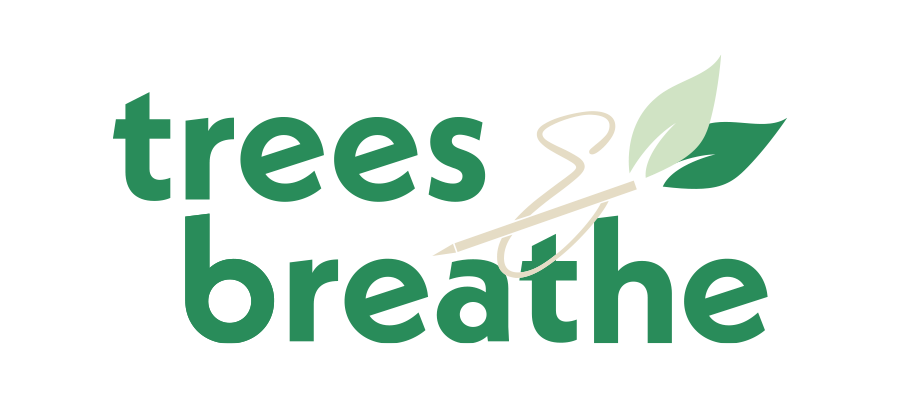 Logo with the words "trees breathe" in green, with a sewing needle and thread weaving through leaves.