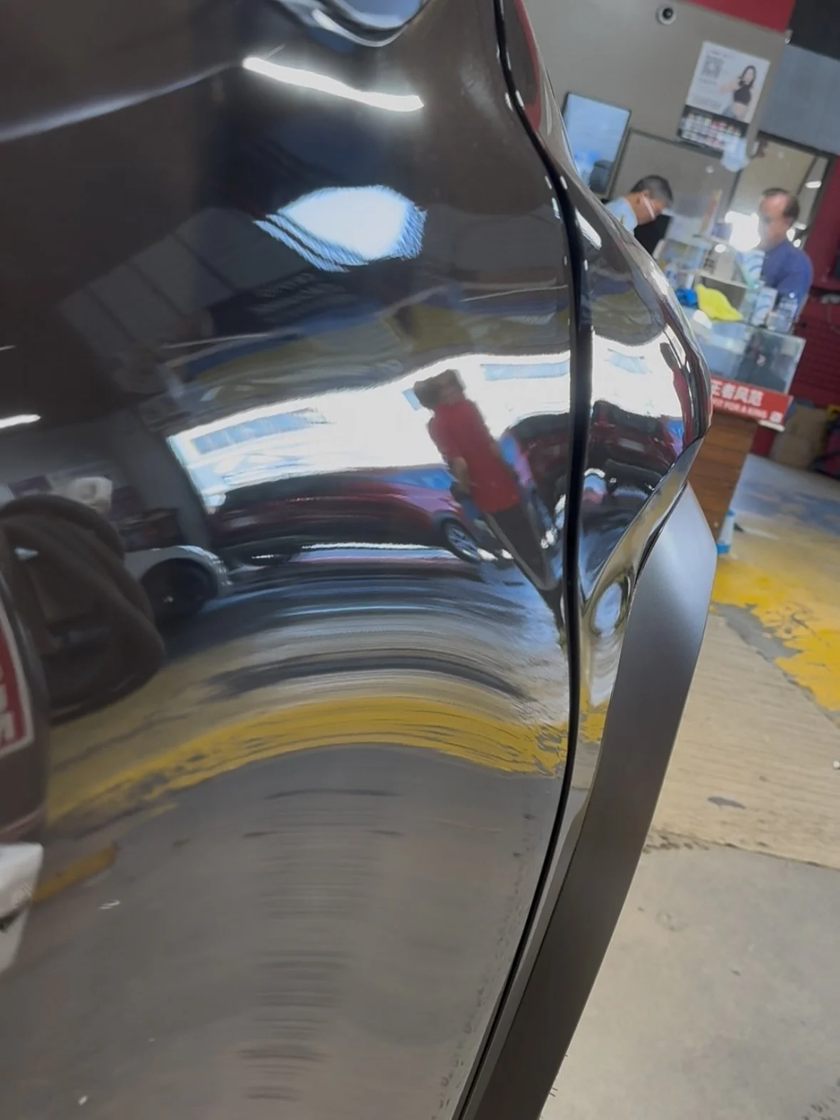 Something got jammed between the fender and door while closing. 
It pulled the lip out as well and the whole fender is now sticking out further than the door.
The bracket that holds the fender is yanked out from the body by a little bit.
A bit of ham