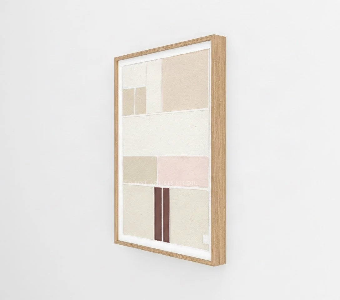 Angled side perspective of the framed abstract geometric print Schema I by Aggeliki Dimitriadou, showcasing the natural grain of the oak wood frame against a seamless, bright white studio background.