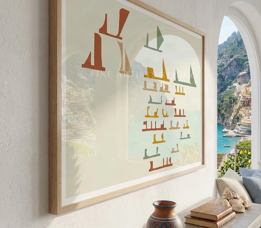 Angled close-up view of a panoramic print in a natural wood frame mounted on a rough, sandy textured stucco wall under bright, warm lighting.