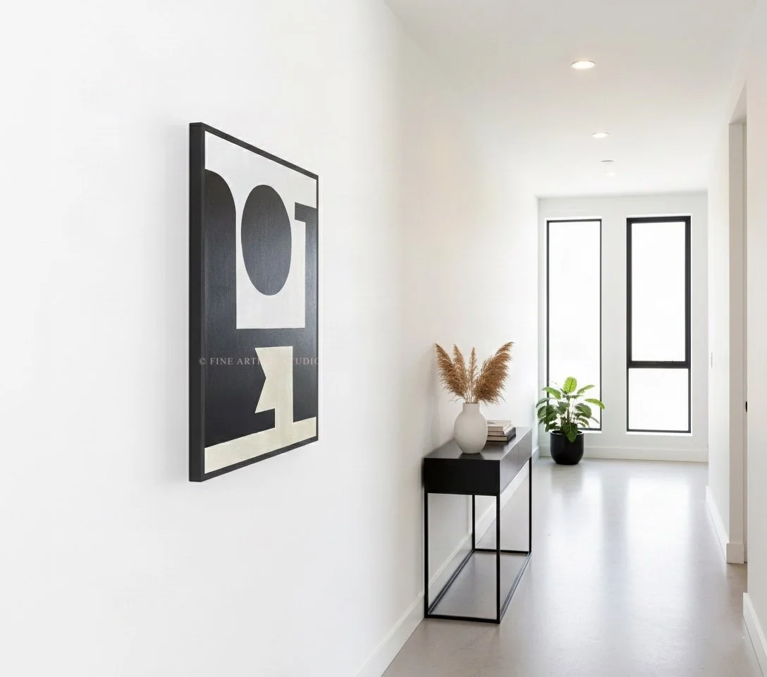 The abstract painting "Signal I" displayed on a white hallway wall above a minimalist black console table, showcasing its scale in a modern home interior.