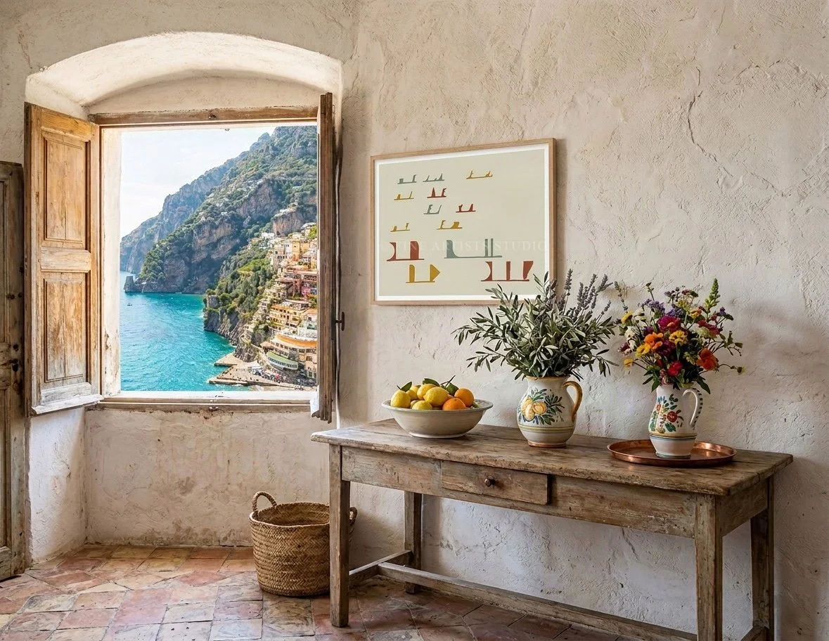 Angled shot of a framed modern geometric print displayed on a luxury limestone villa balcony with a stunning sea view and vibrant coastal pines.