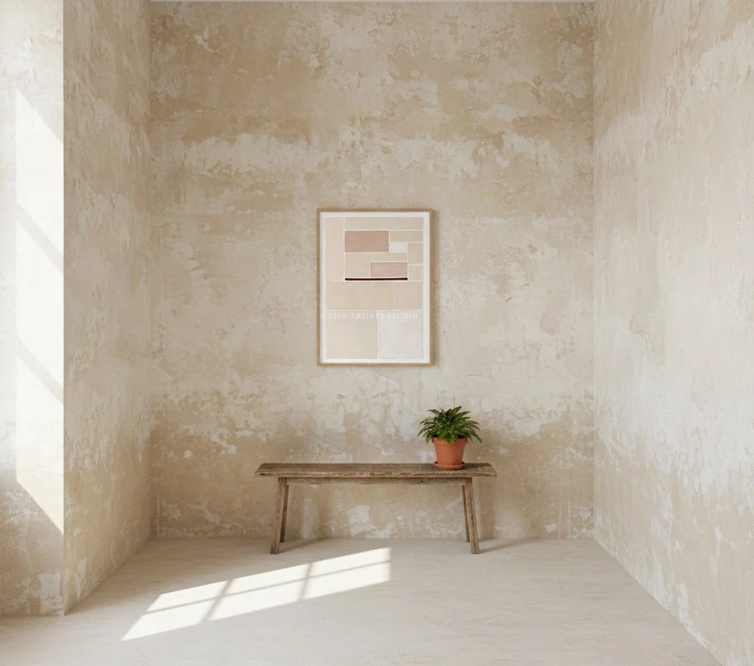Framed abstract print SCHEMA II by Aggeliki Dimitriadou for Fine Artists studio on a rustic stone wall over a simple wood bench.