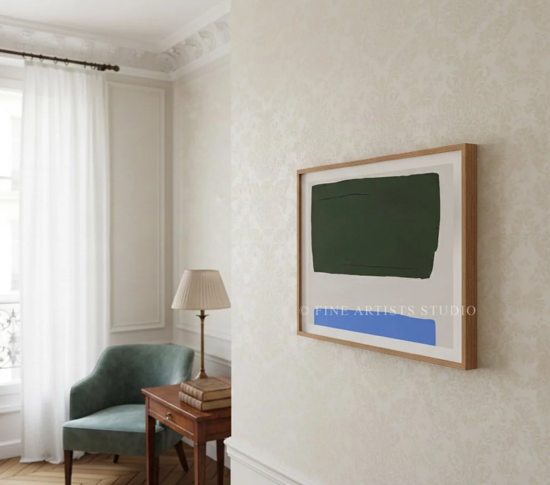 Vertical aura gradient art print in a natural wood frame styled in a bright, modern living room with organic textiles and contemporary furniture.
