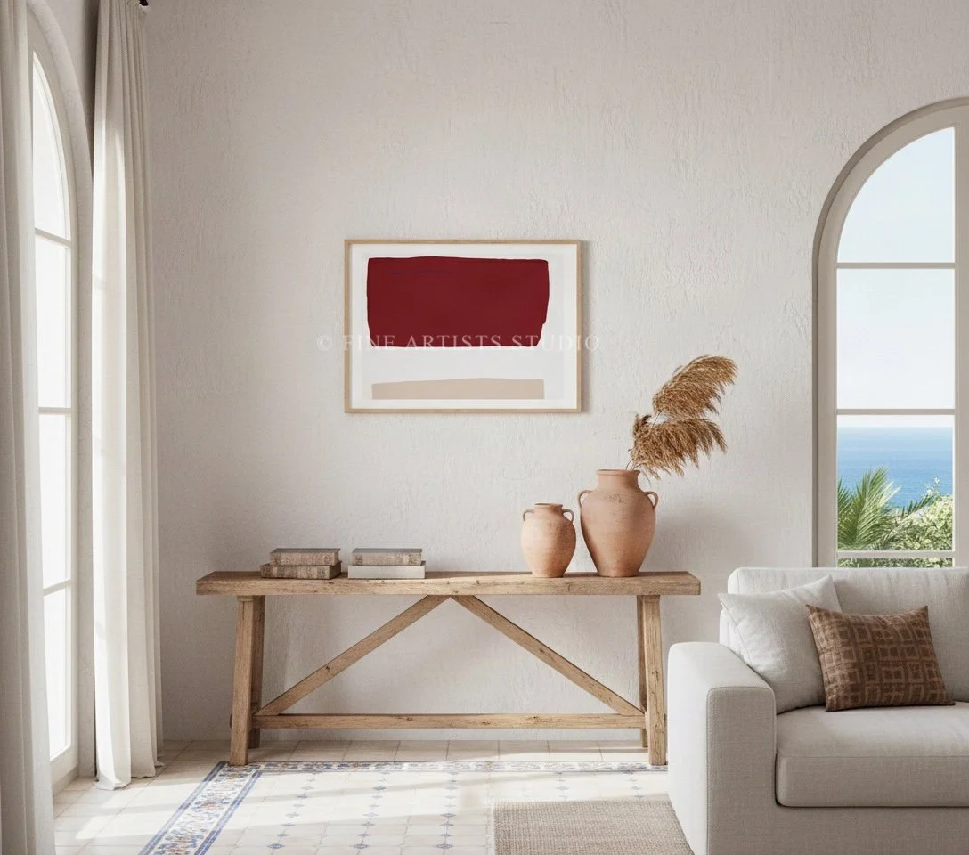 Ethereal red and pink abstract shape print styled in a mid-century modern room, hanging on a warm beige wall above a dark wood sideboard credenza.