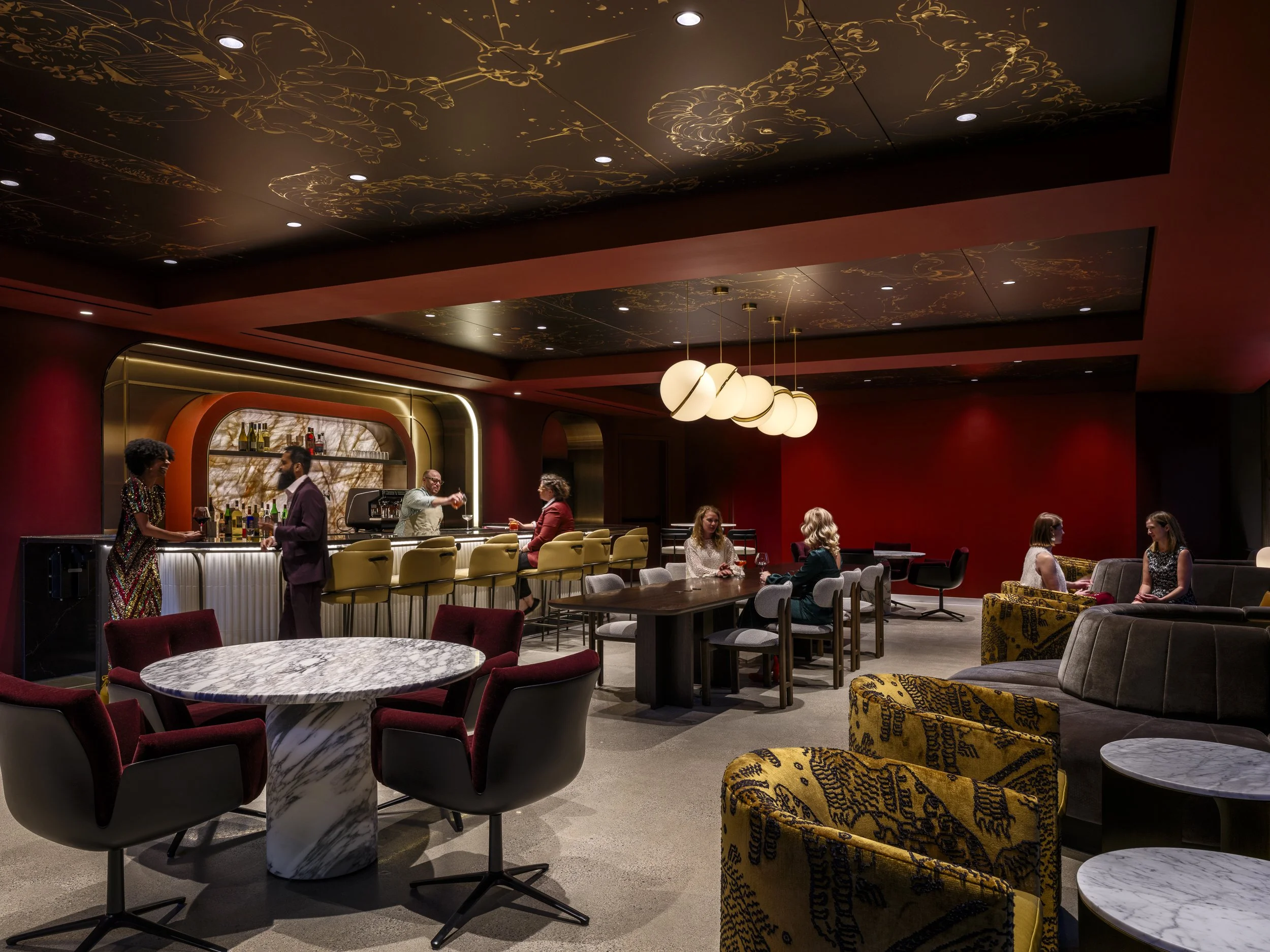 Aries Club Designed by Gensler Boston MA modern futuristic design Loung Bar area with a group of impeccably dressed people for a night out 