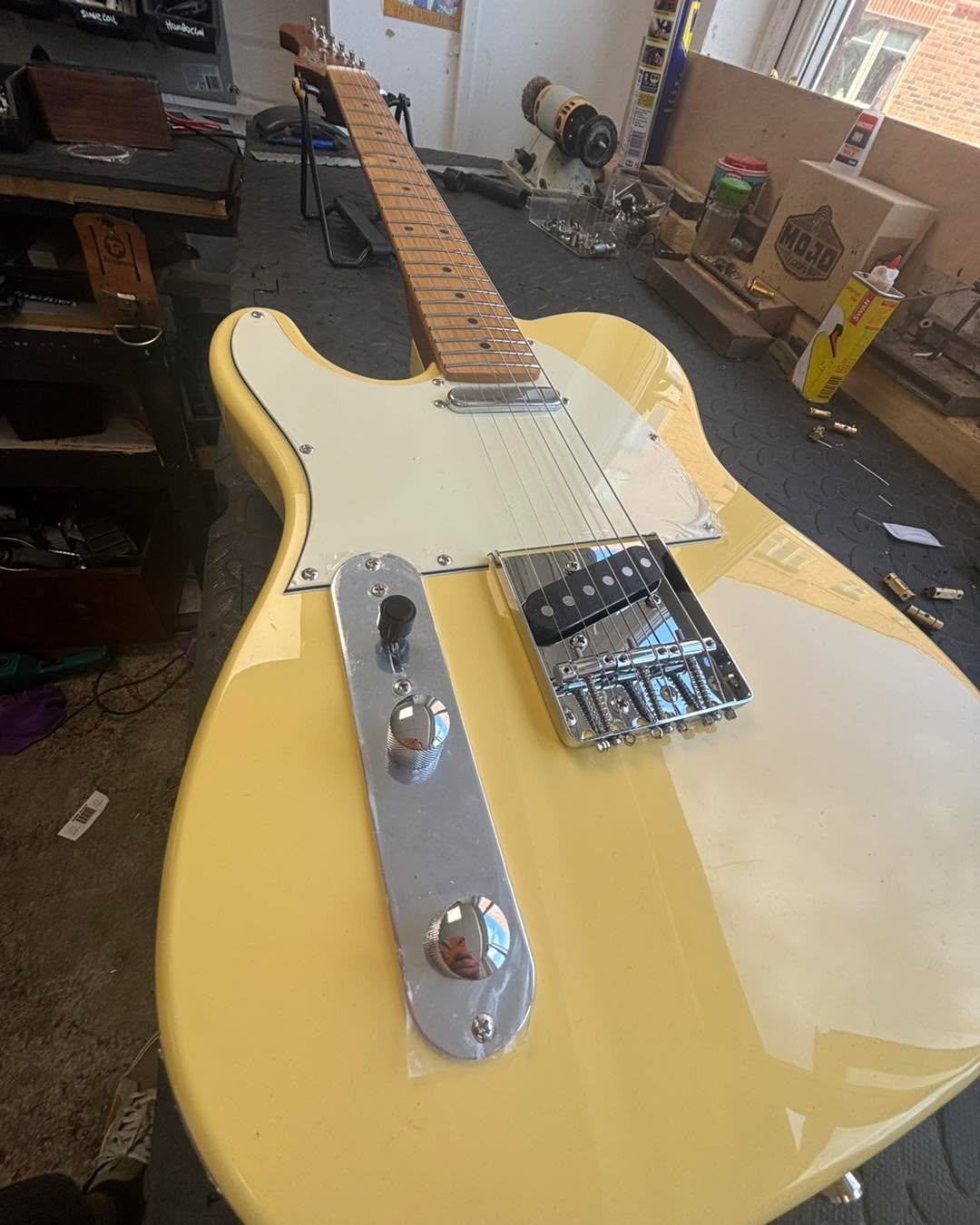 New brass saddles a rolled neck and set up