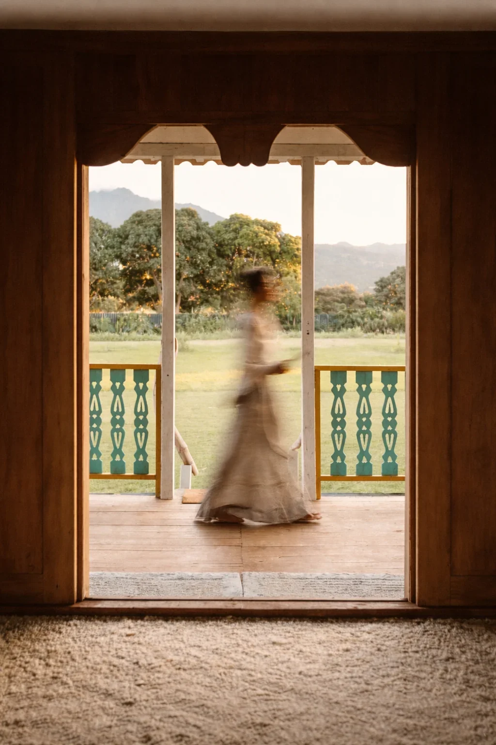Lindsay walking across the threshold