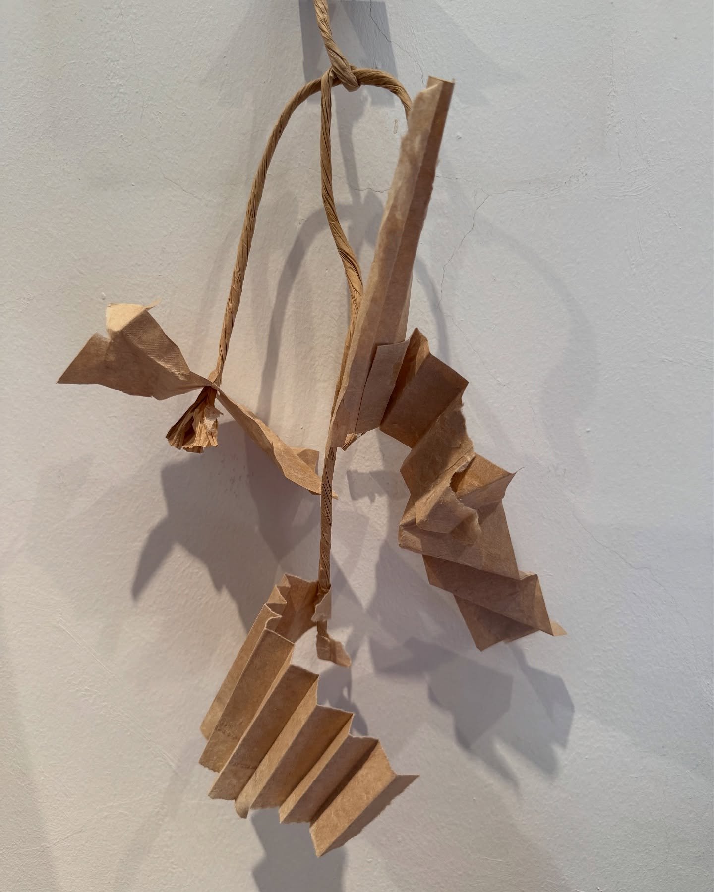 Getting creative with a Muji paper bag. Playing with the theme of unfolding - and how in some senses it makes me think of deconstructing and taking apart. So with the limited art materials I have with me on my travels - I made a sculpture from a pape