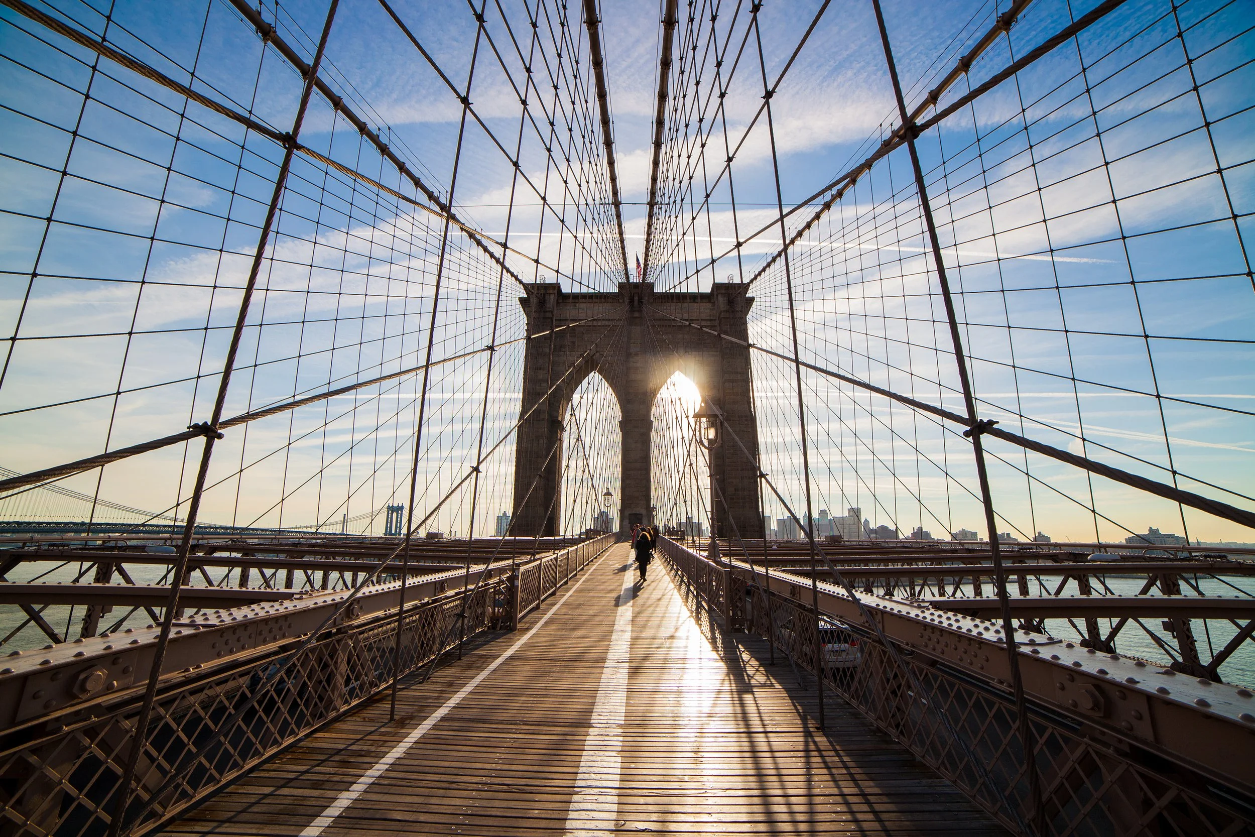sunrise at brroklin bridge in new york city durin winter
