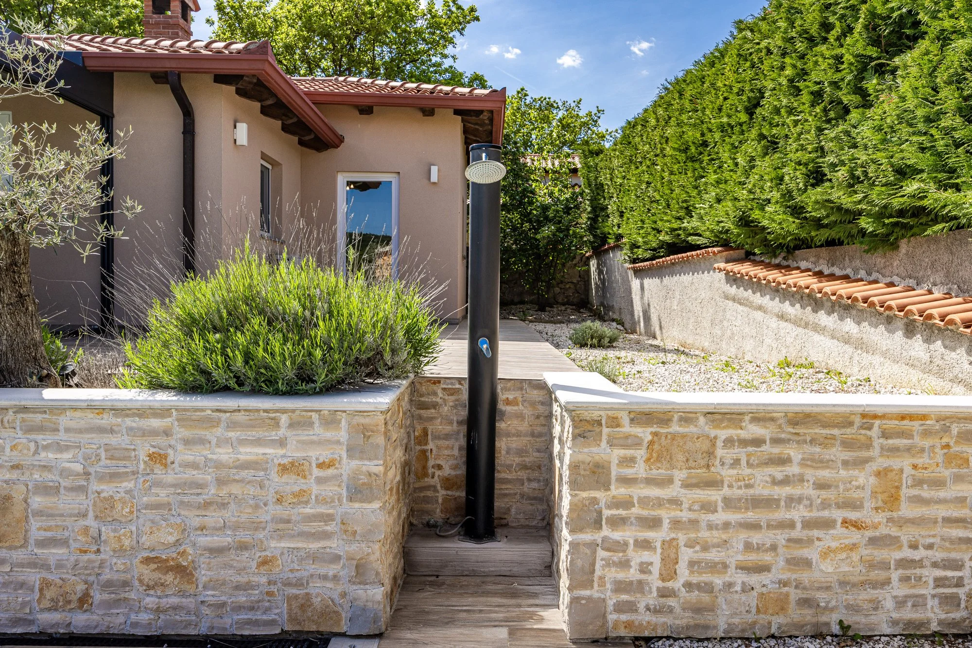 View of the outdoor shower at a luxury villa in Istria