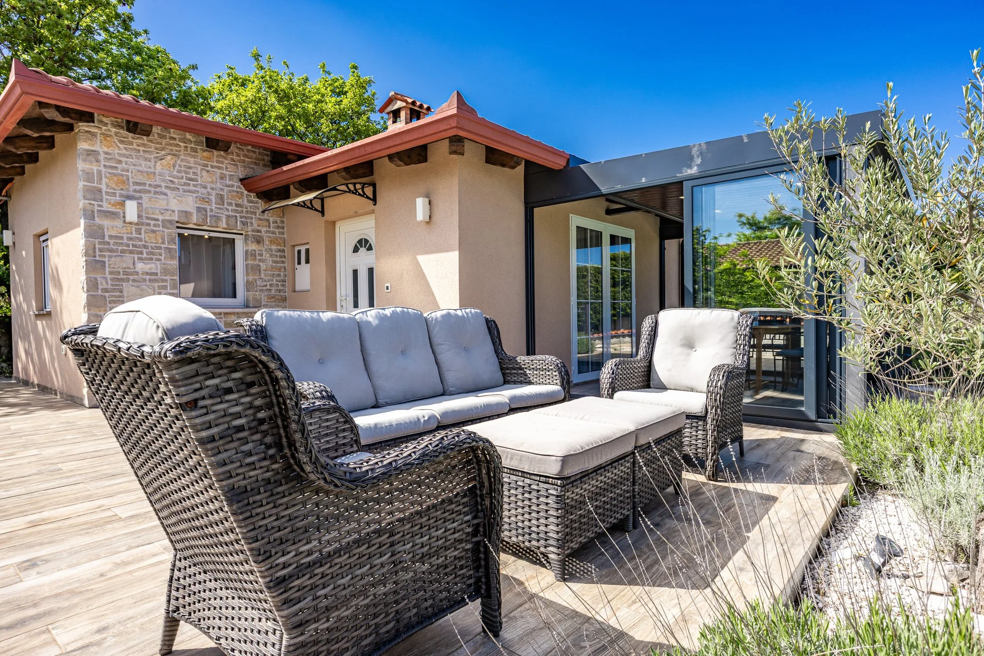 Comfortable outdoor seating area in a villa with pool