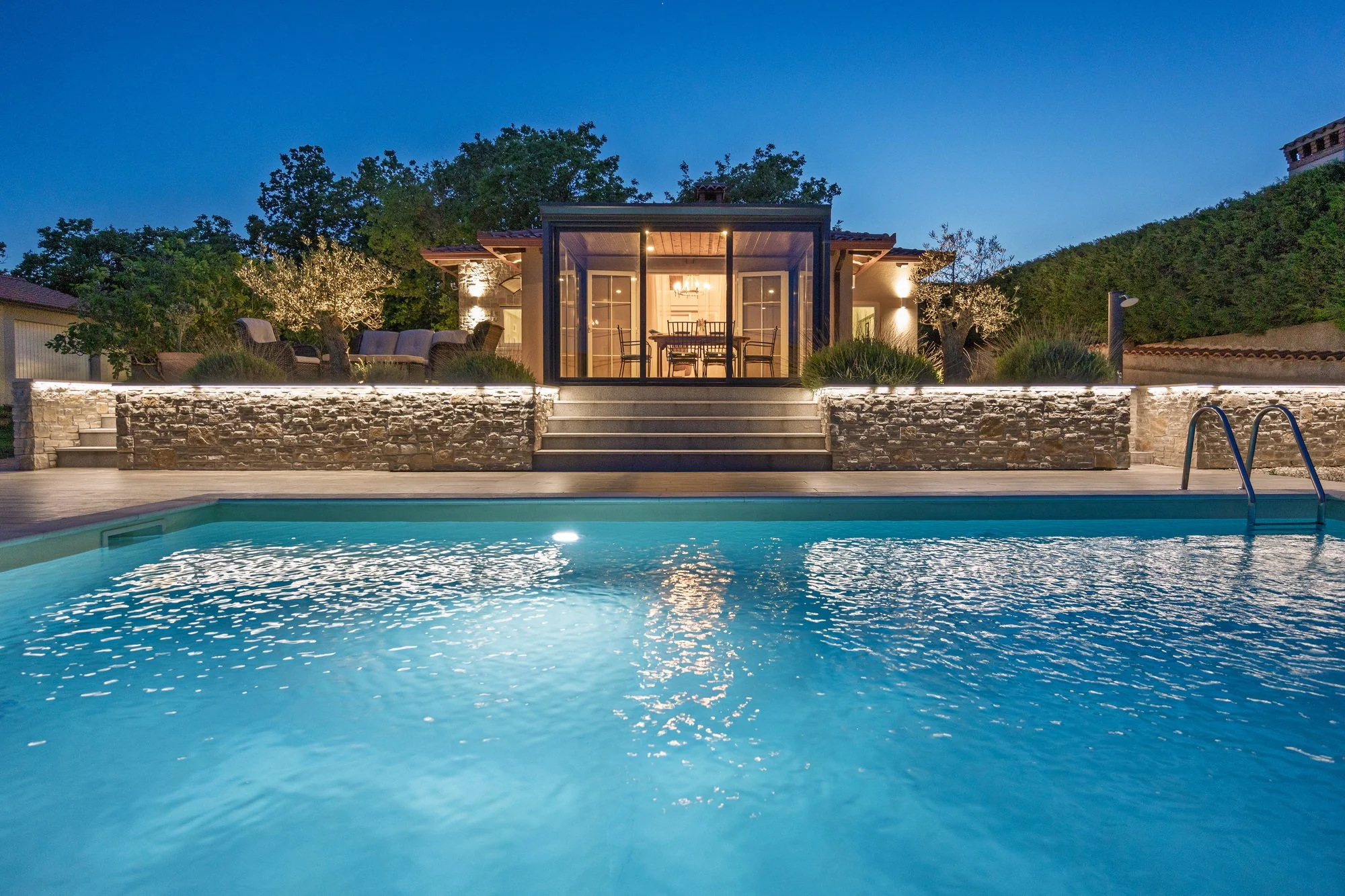 Night view of a private villa with pool in Istria