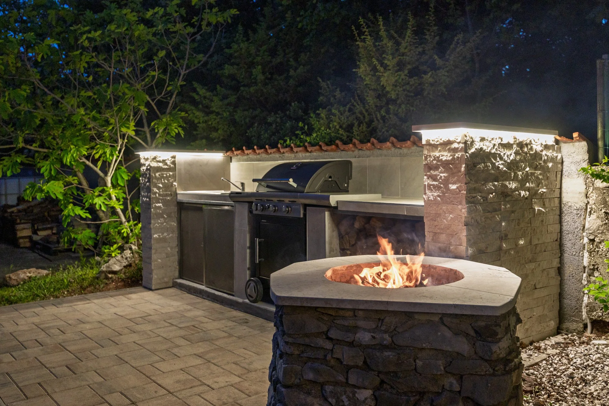 Evening atmosphere at the outdoor barbecue in a private villa in Istria