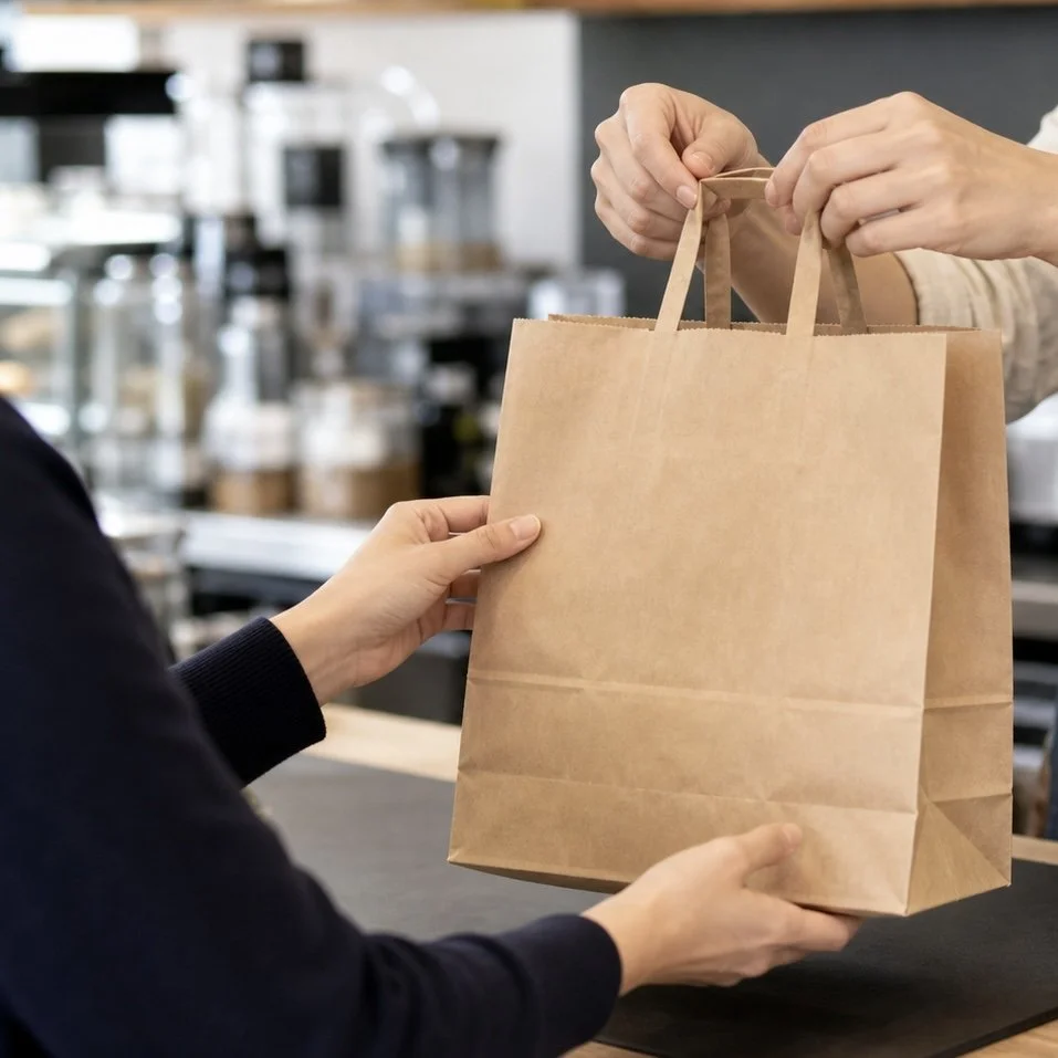 Custom retail and promotional packaging solutions including printed shopping bags, die-cut handle bags, and branded flexible packaging.