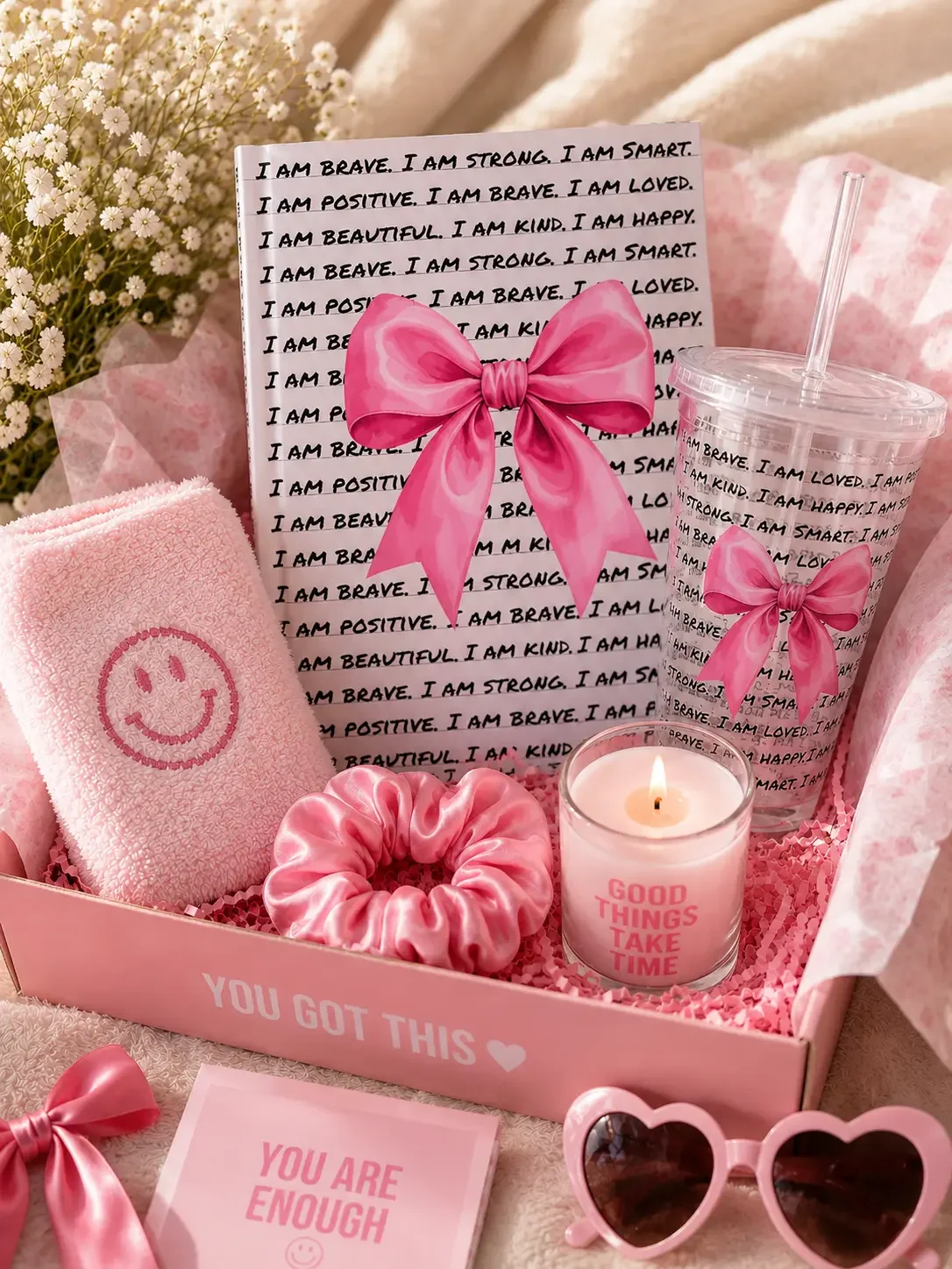 Preppy pink gift box filled with a matching affirmations journal, tumbler, scrunchie, candle, and positive quote cards.