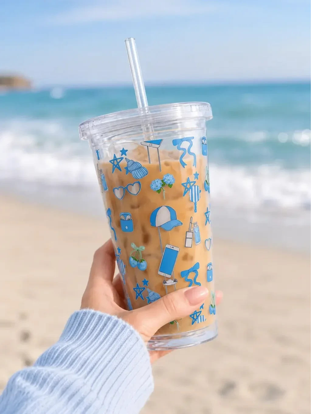 preppy-blue-doodle-tumbler-cup-iced-coffee-beach.webp