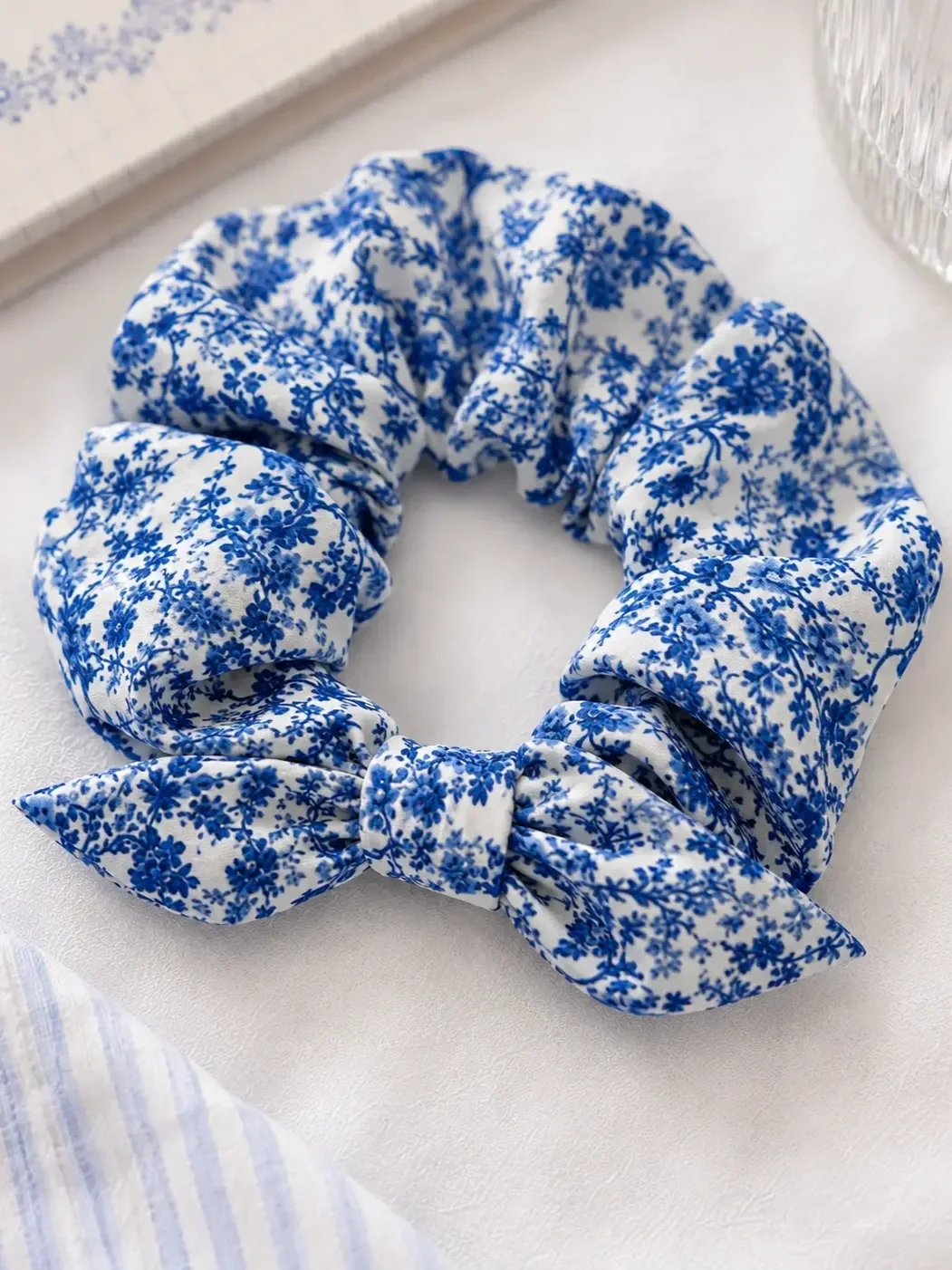 preppy-girl-light-blue-floral-scrunchie-product-closeup.webp