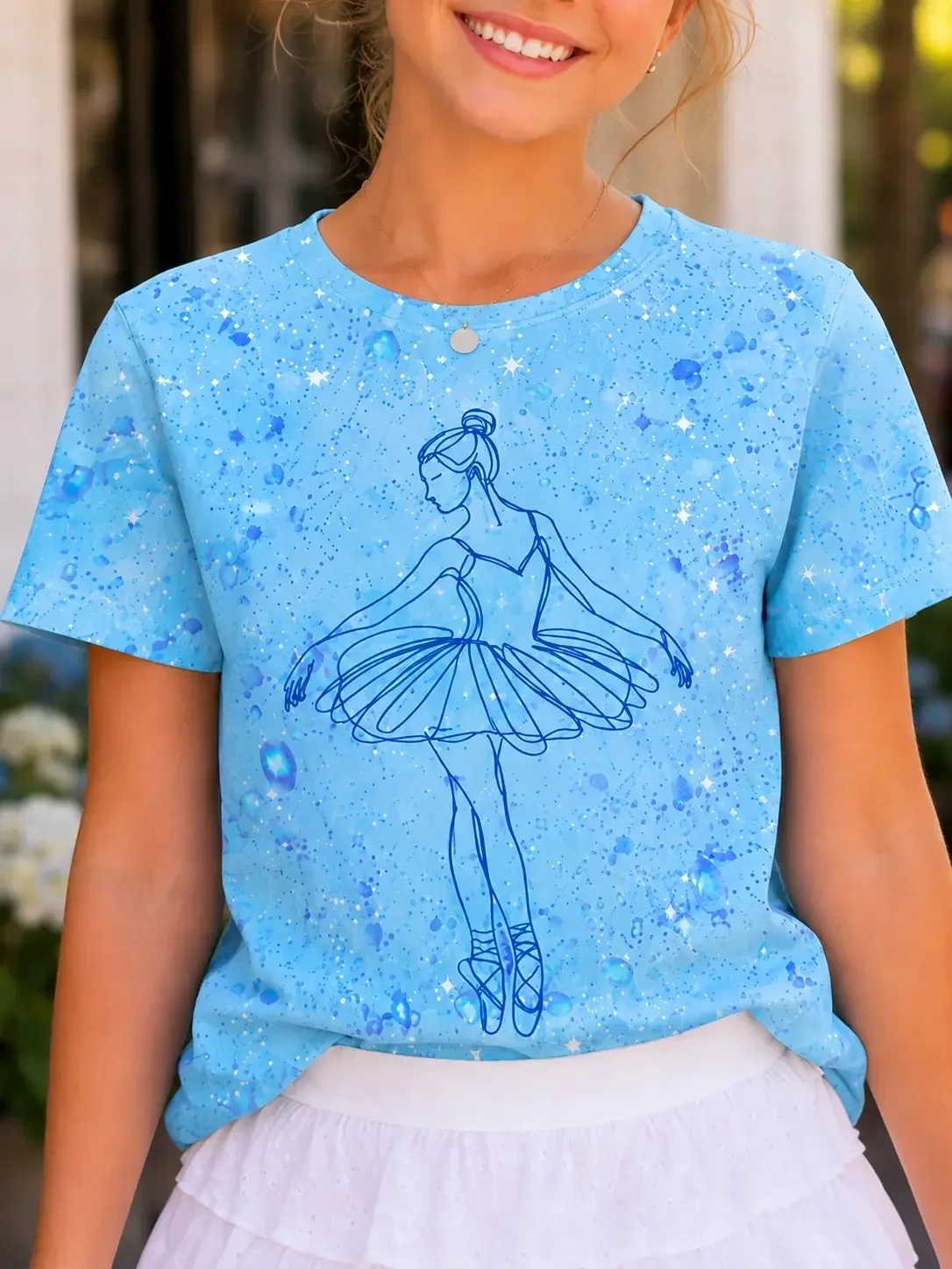 little-ballerina-blue-graphic-tshirt-close-up.webp