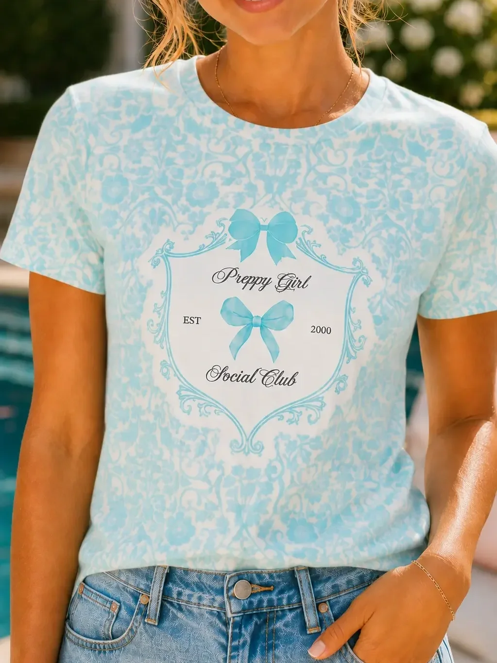 preppy-girl-social-club-blue-shirt-close-up.webp