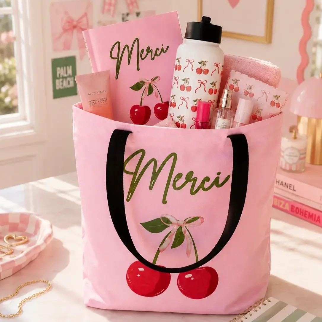 pink-cherry-merci-tote-bag-aesthetic-desk-setup.webp