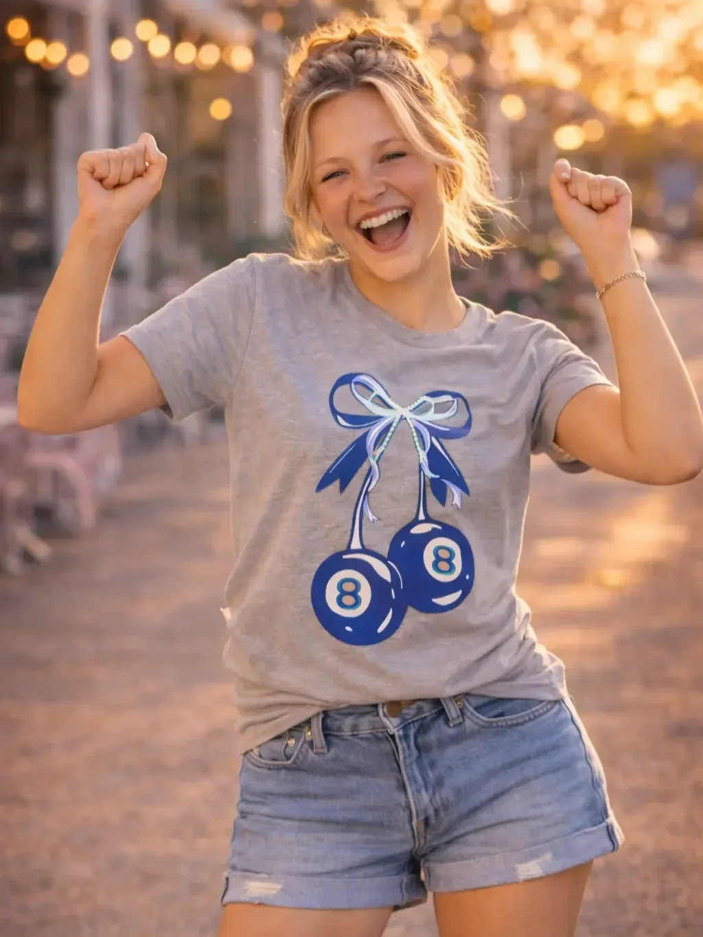 girls-grey-eight-ball-cherry-tee-excited-pose.webp