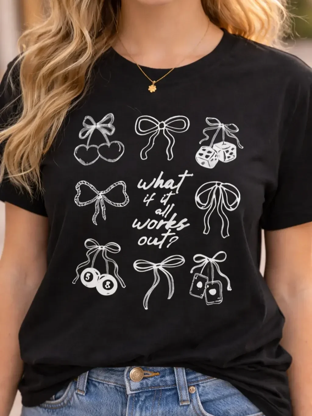 girls-black-graphic-tee-close-up-design.webp