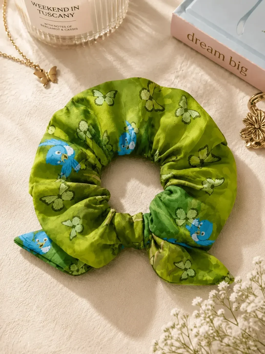 green-butterfly-and-bird-print-scrunchie-with-bow.webp