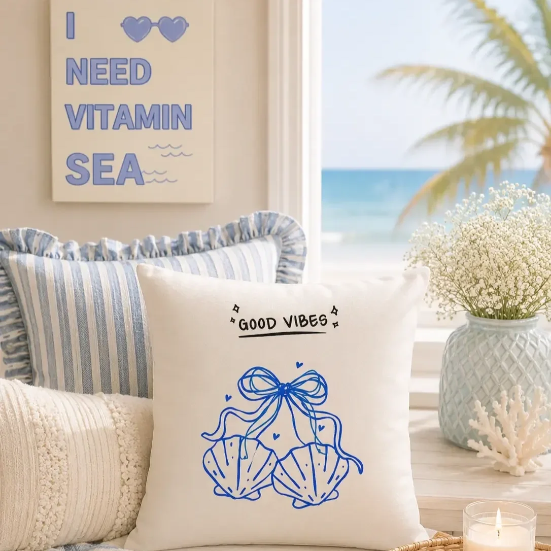 doodles-and-saffron-good-vibes-seashell-throw-pillow.webp