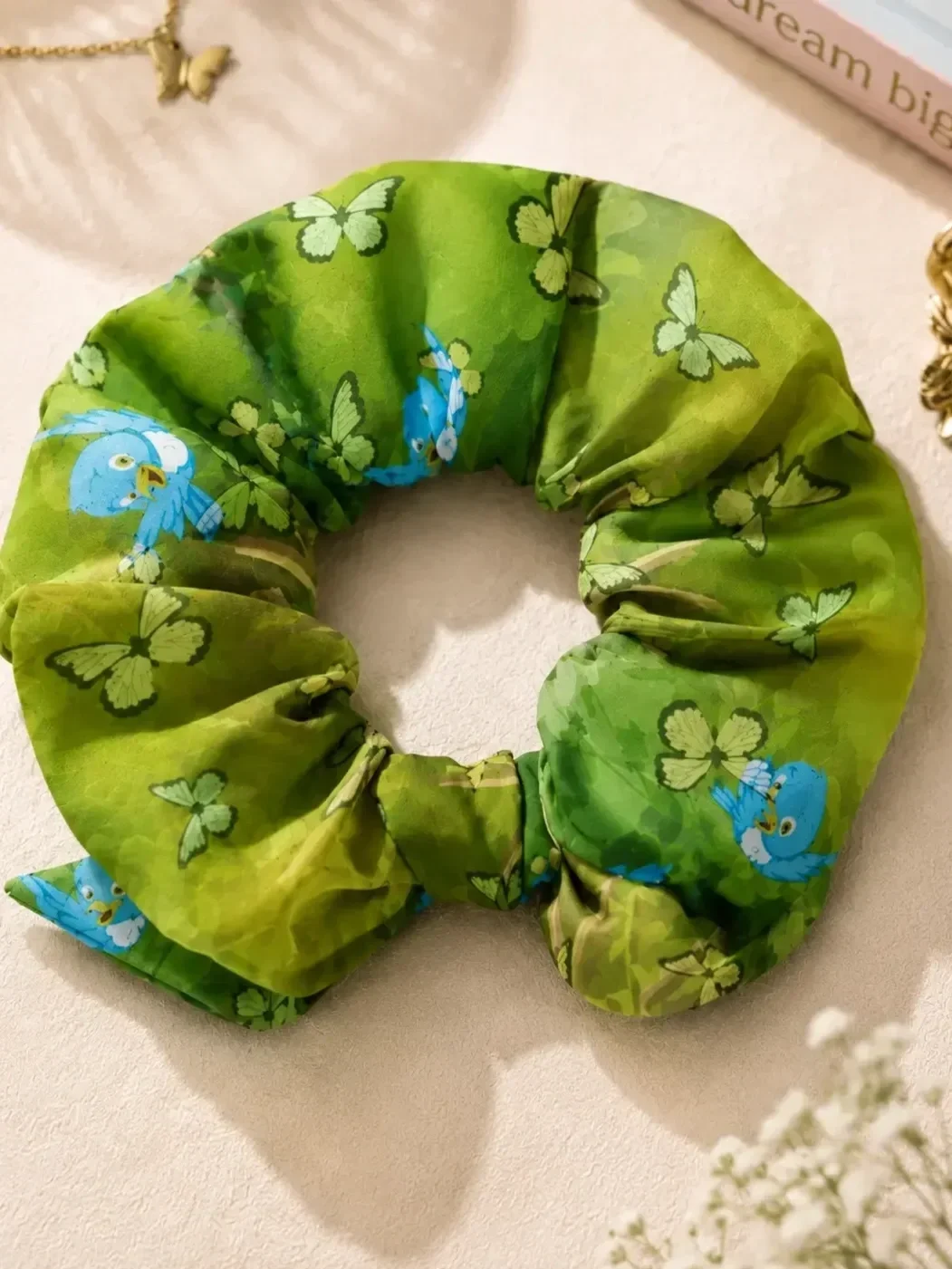 green-butterfly-and-bird-print-scrunchie-with-bow.webp