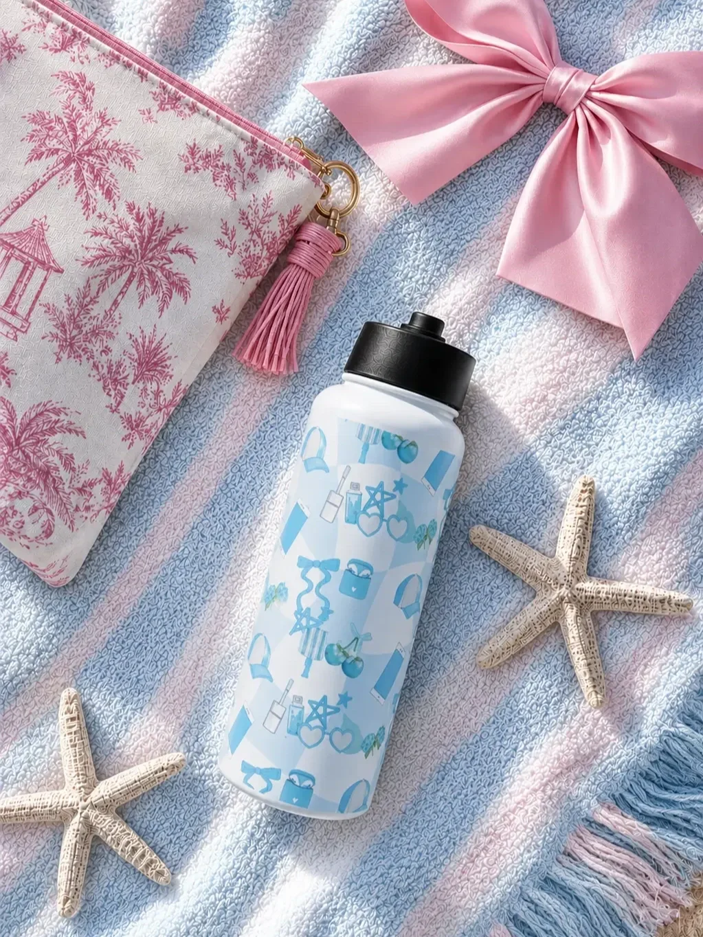 coquette-blue-doodle-print-beach-water-bottle-flatlay.webp