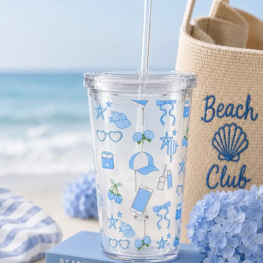preppy-blue-doodle-cold-cup-tumbler-beach-lifestyle.webp
