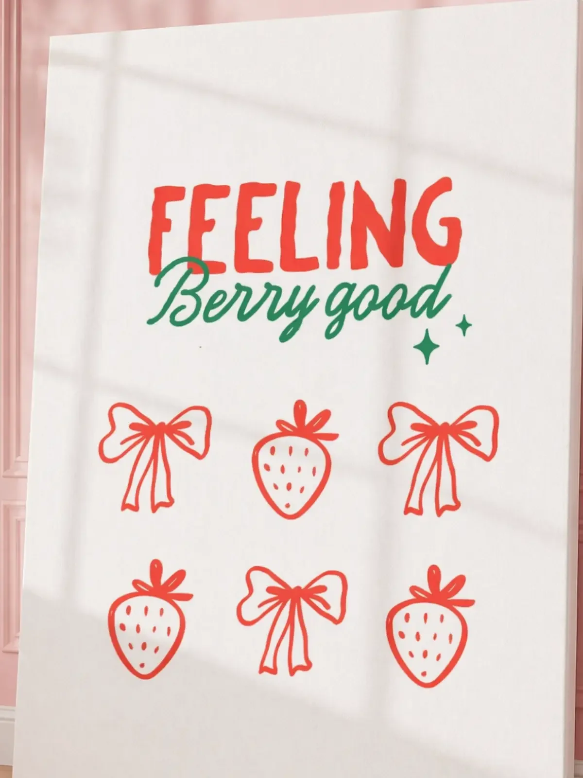 Close up view of Feeling Berry Good strawberry and coquette bow canvas print by Doodles and Saffron highlighting print texture.