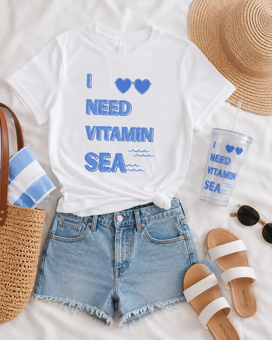 i-need-vitamin-sea-graphic-tee-flat-lay.webp
