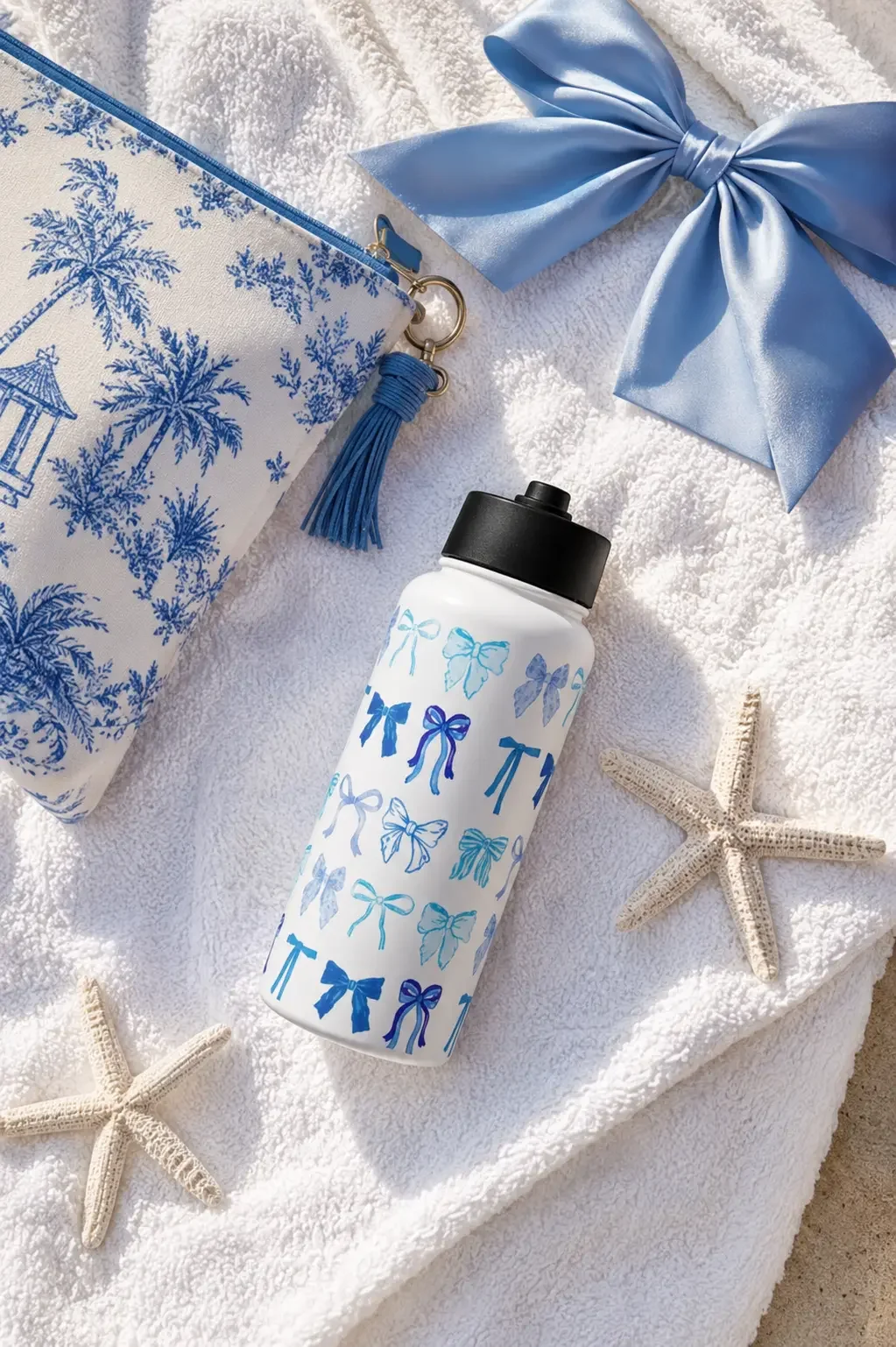 blue-coquette-bows-insulated-water-bottle-beach-style.webp