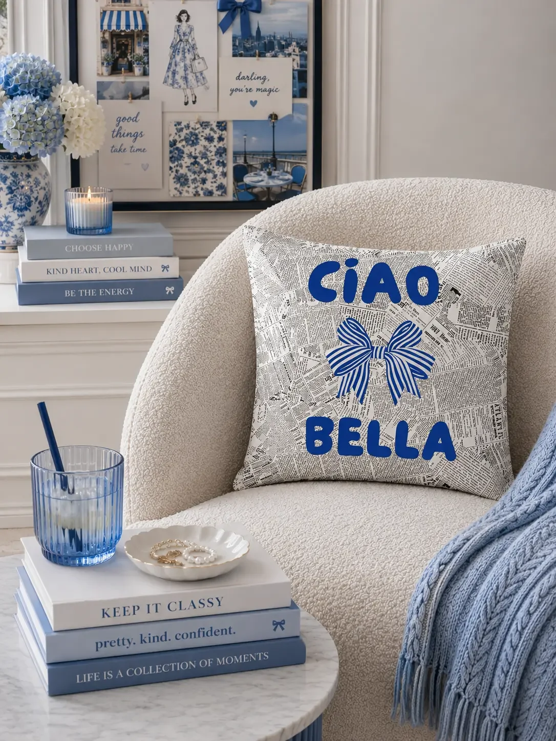 ciao-bella-blue-striped-bow-newspaper-pillow-in-chair.webp