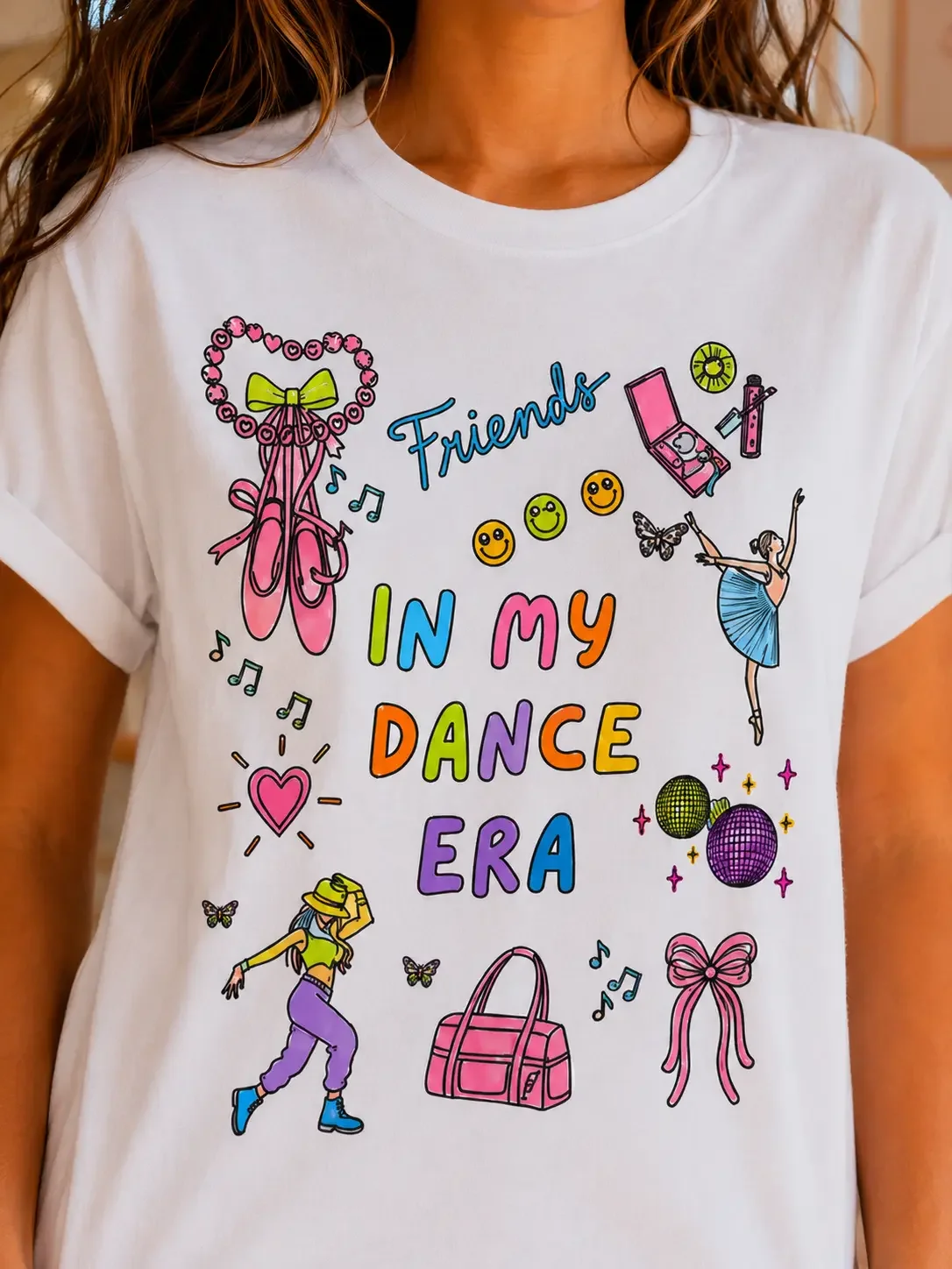 Detailed close-up of a white graphic tee featuring a colored unicorn sketch design with motivational text.