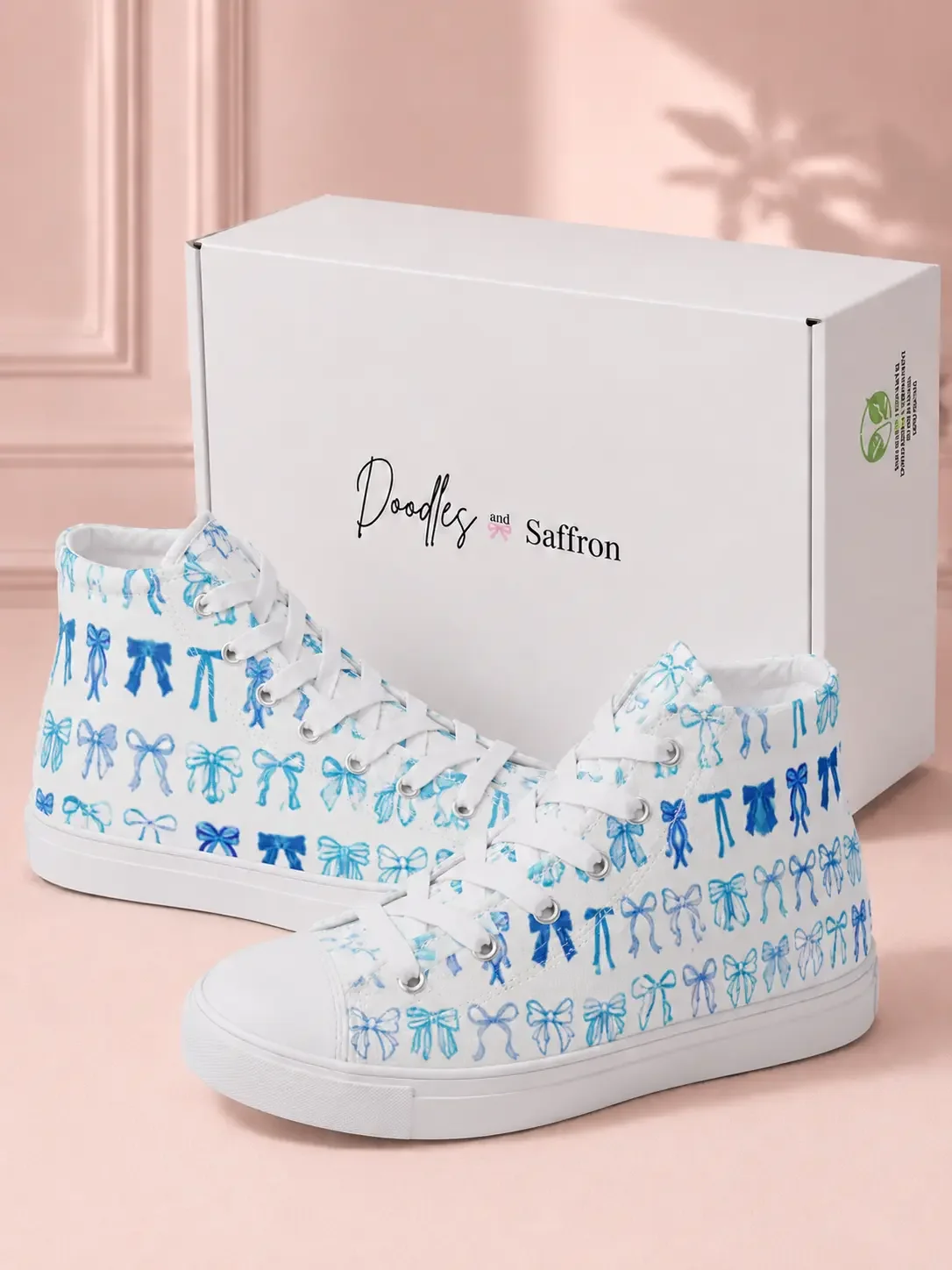 blue-coquette-bow-canvas-sneakers-shoebox-packaging-view.webp