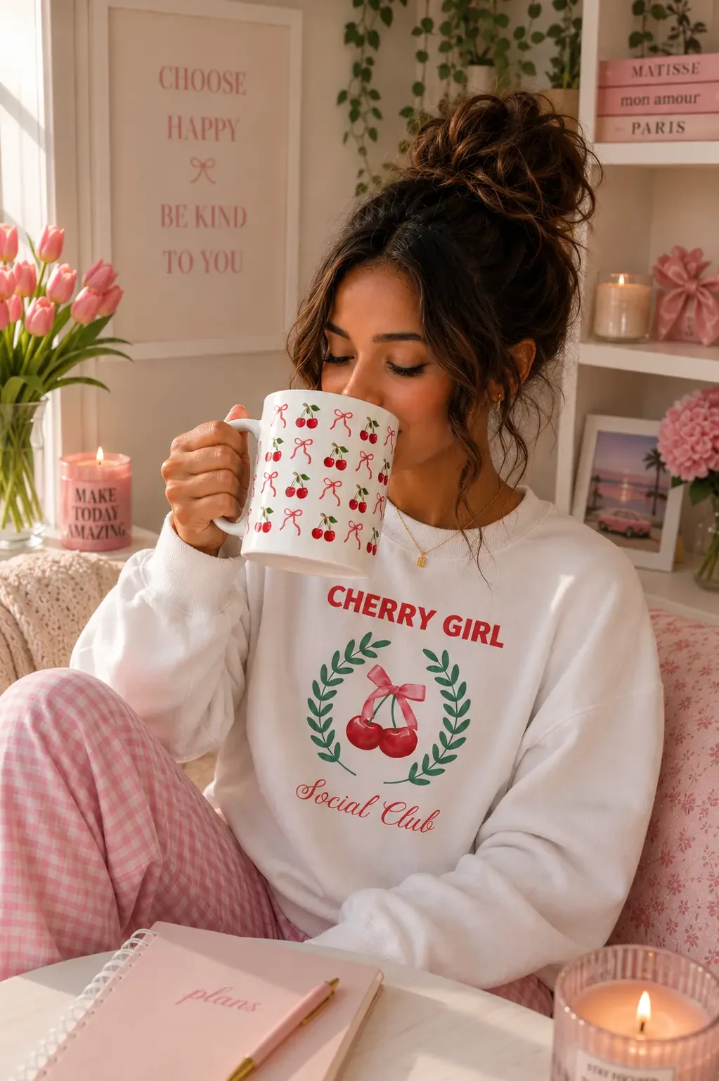 Cherry-girl-sweatshirt-drinking-from-mug.webp