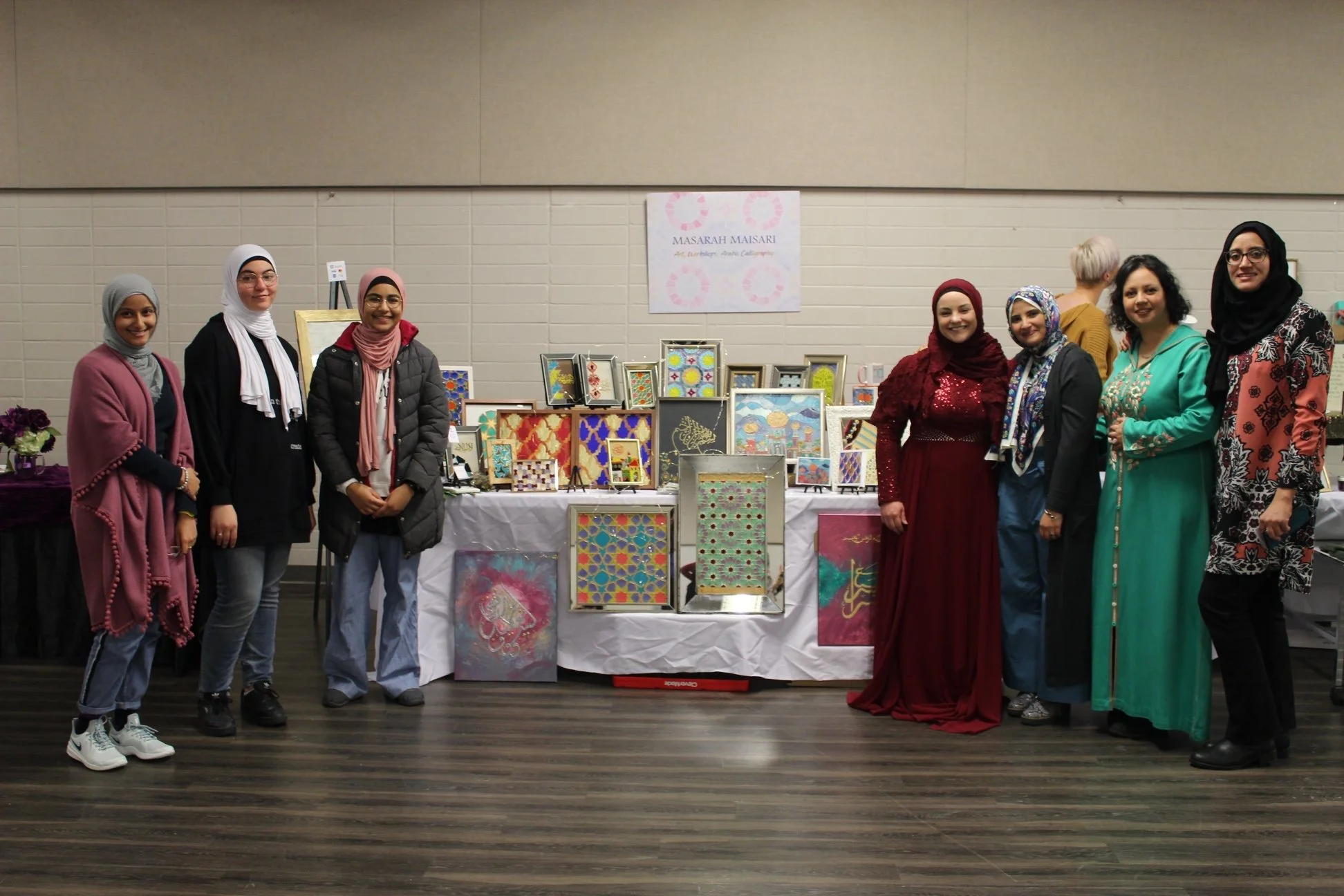 Art vendor at women of faith conference with speaker at calgary event