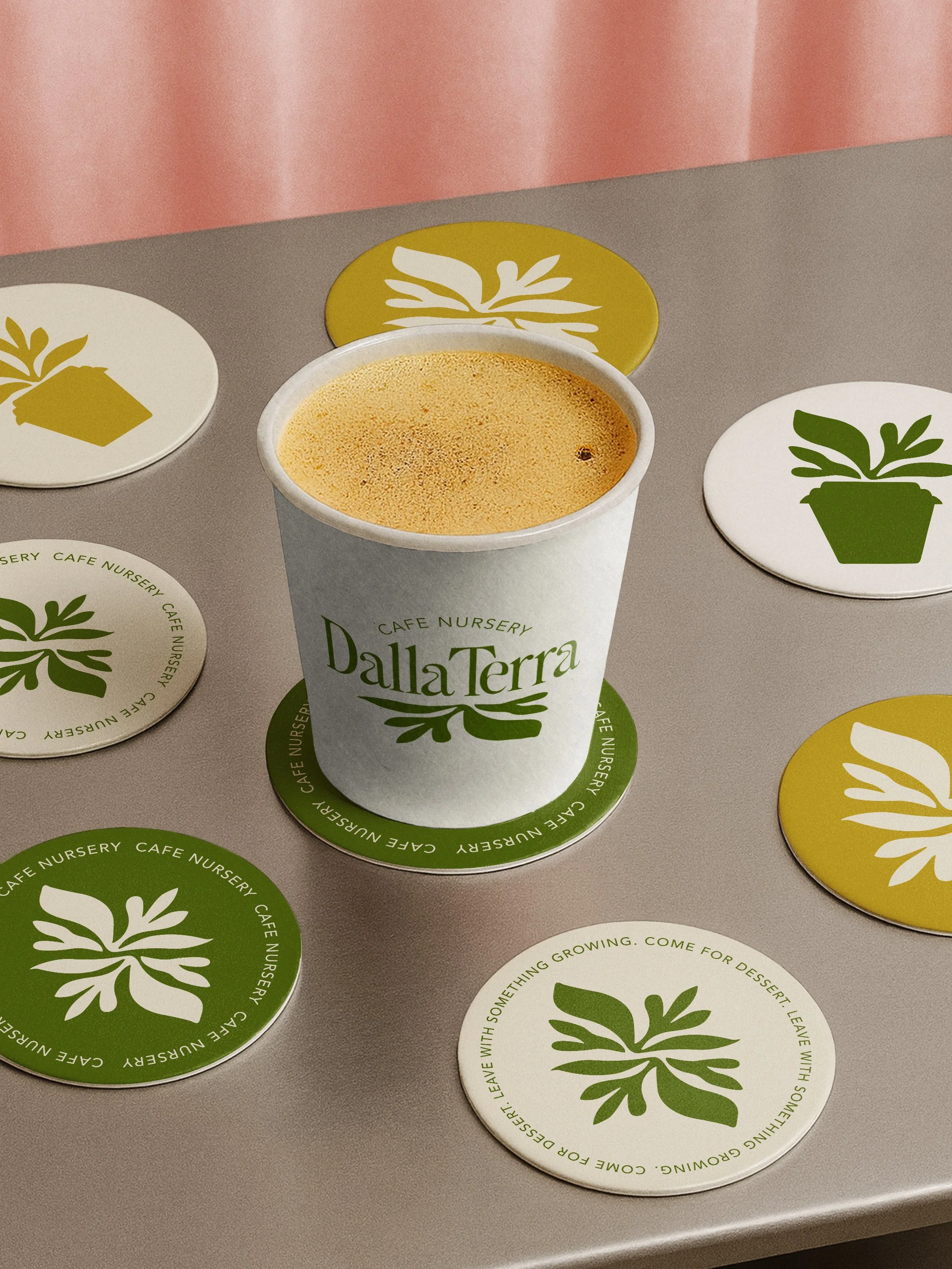 coffee-cup-with-coasters-mockups-on-table.jpg