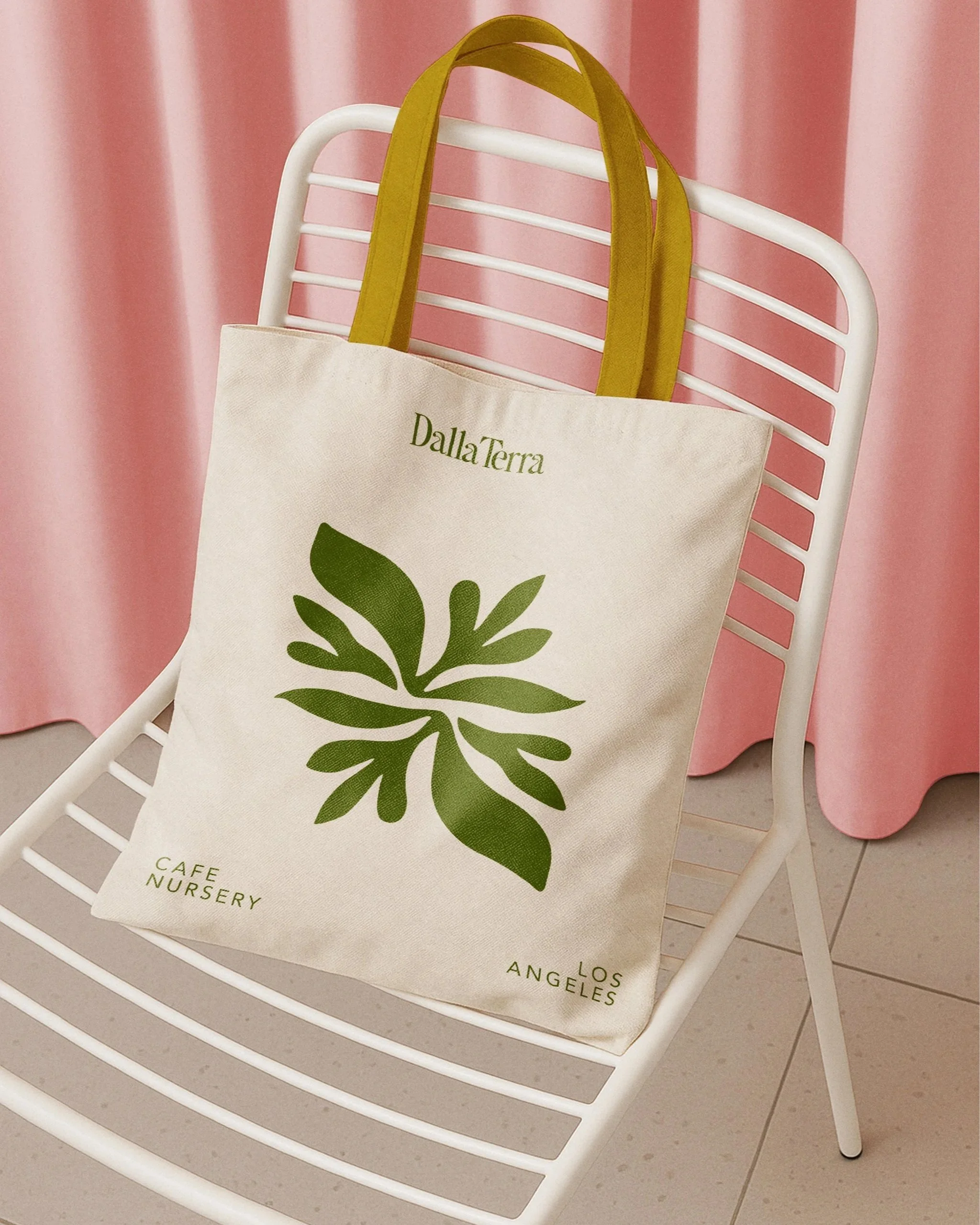 tote-bag-mockup-on+metail-chair-front-view.jpg