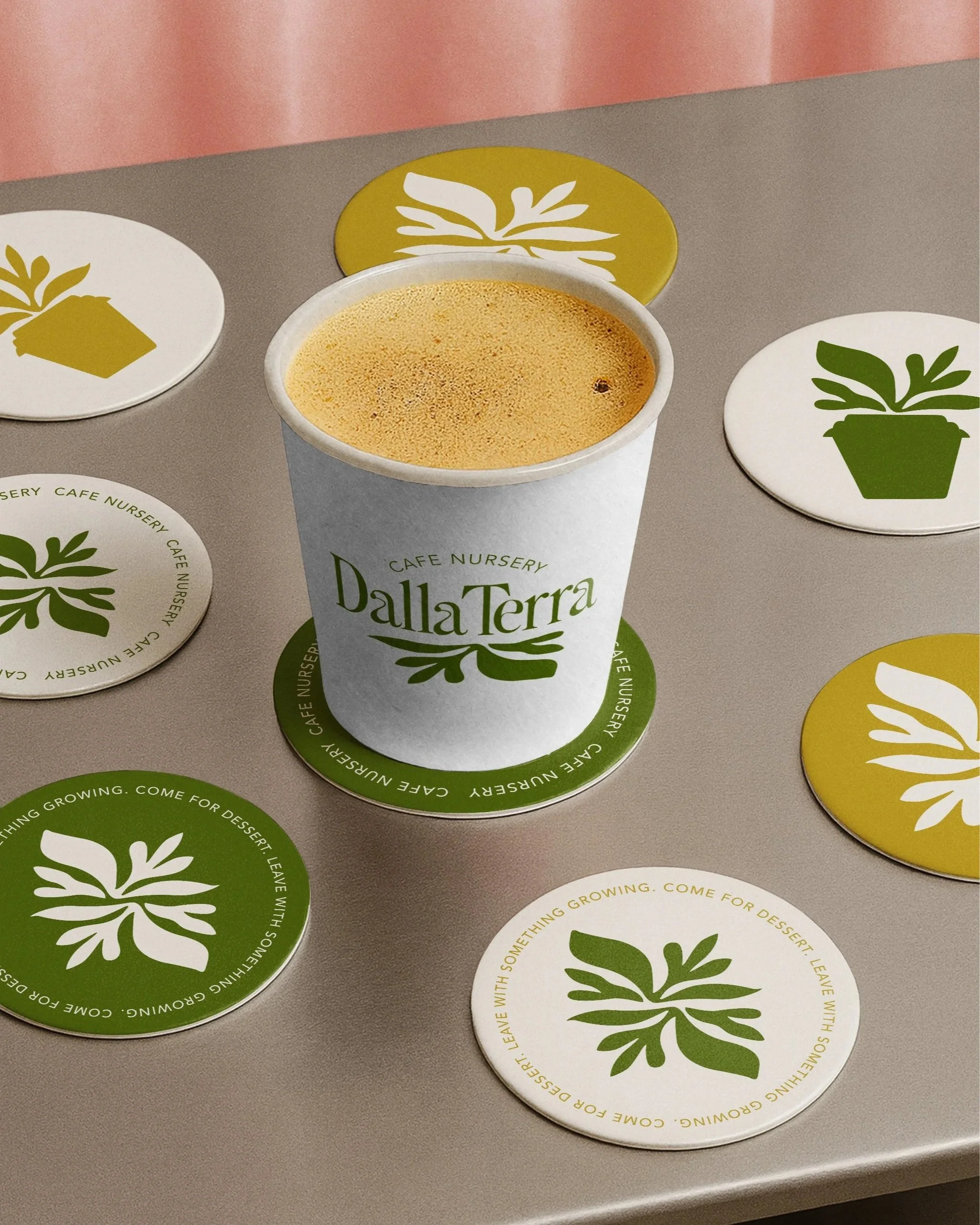 coffee-cup-with-coasters-mockups-on-table.jpg