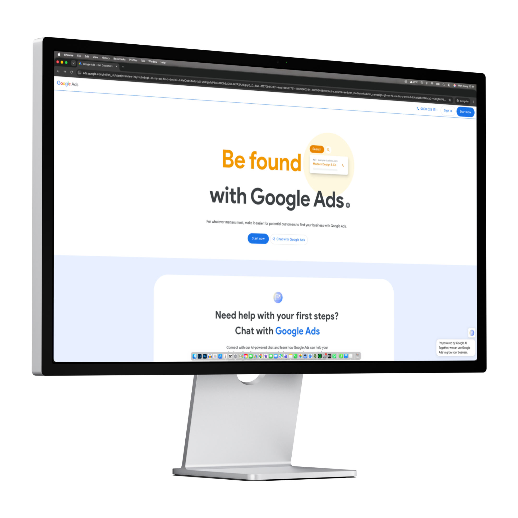Apple iMac computer displaying Google Ads webpage with a partial view of the screen and website content visible.