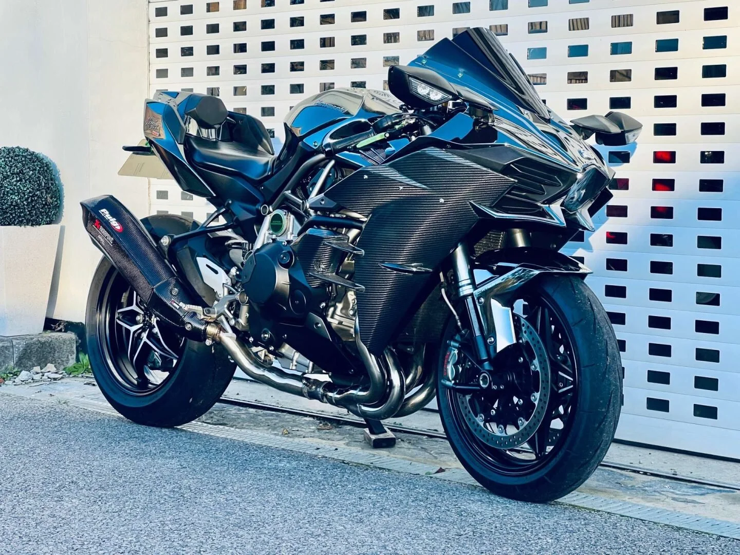 A Kawasaki Ninja H2 in Carbon Black bought by Church's.