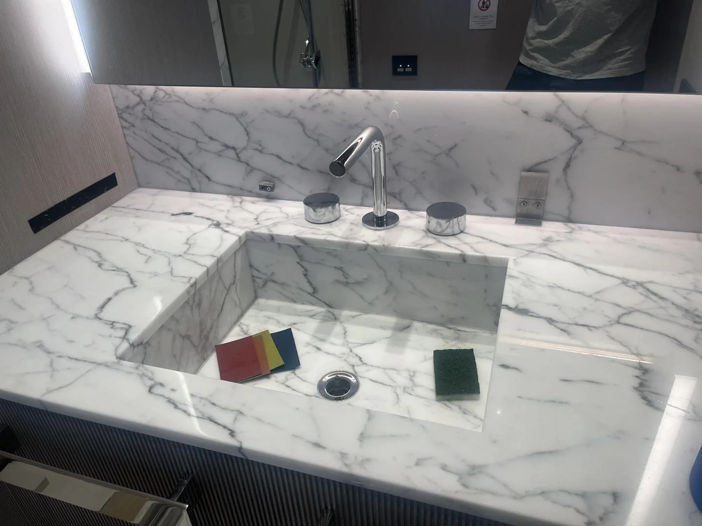 Polished marble bathroom sink after professional marble restoration in Blackpool
