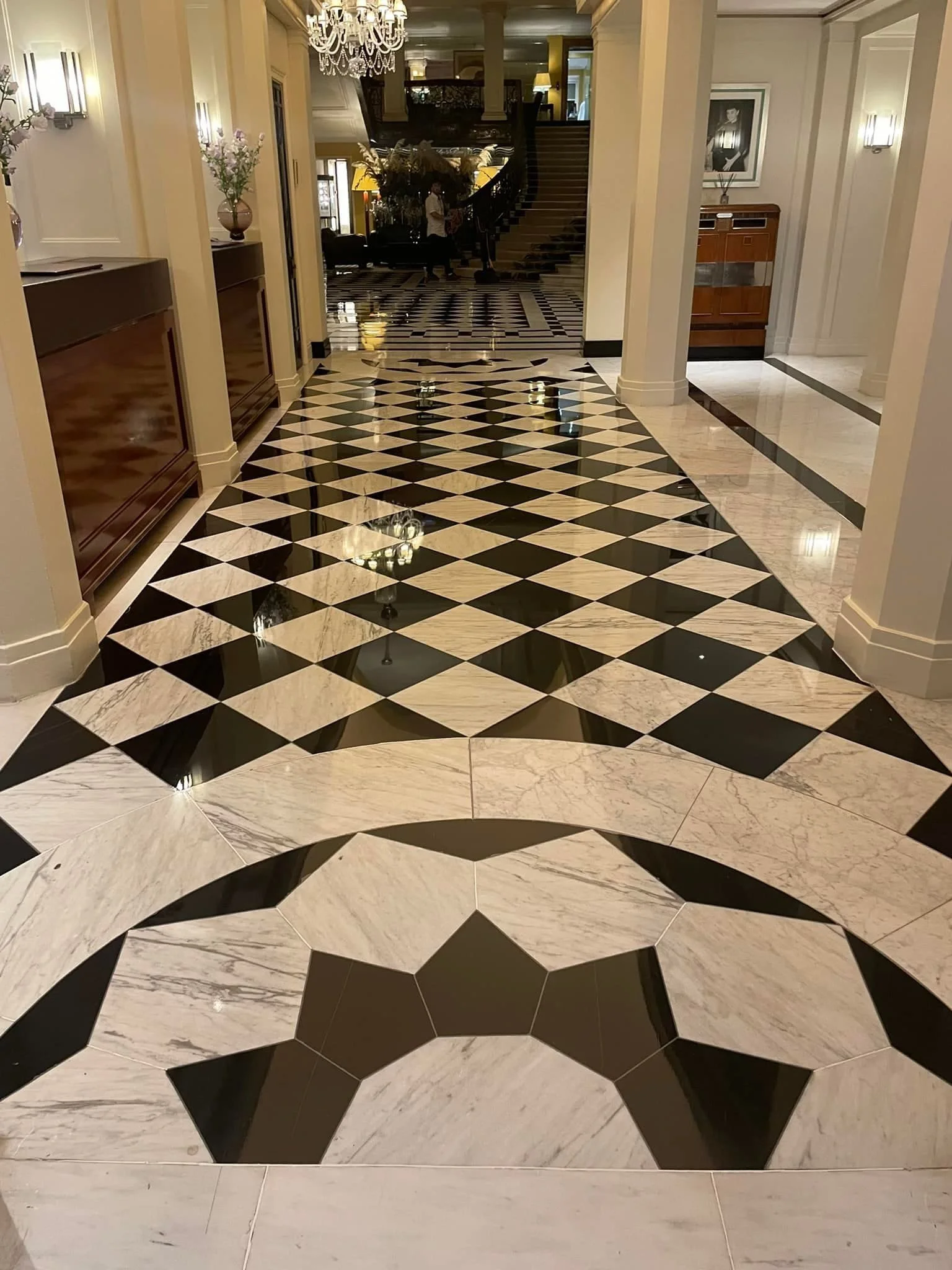 Restored black and white marble tiled hallway in commercial property in Blackpool