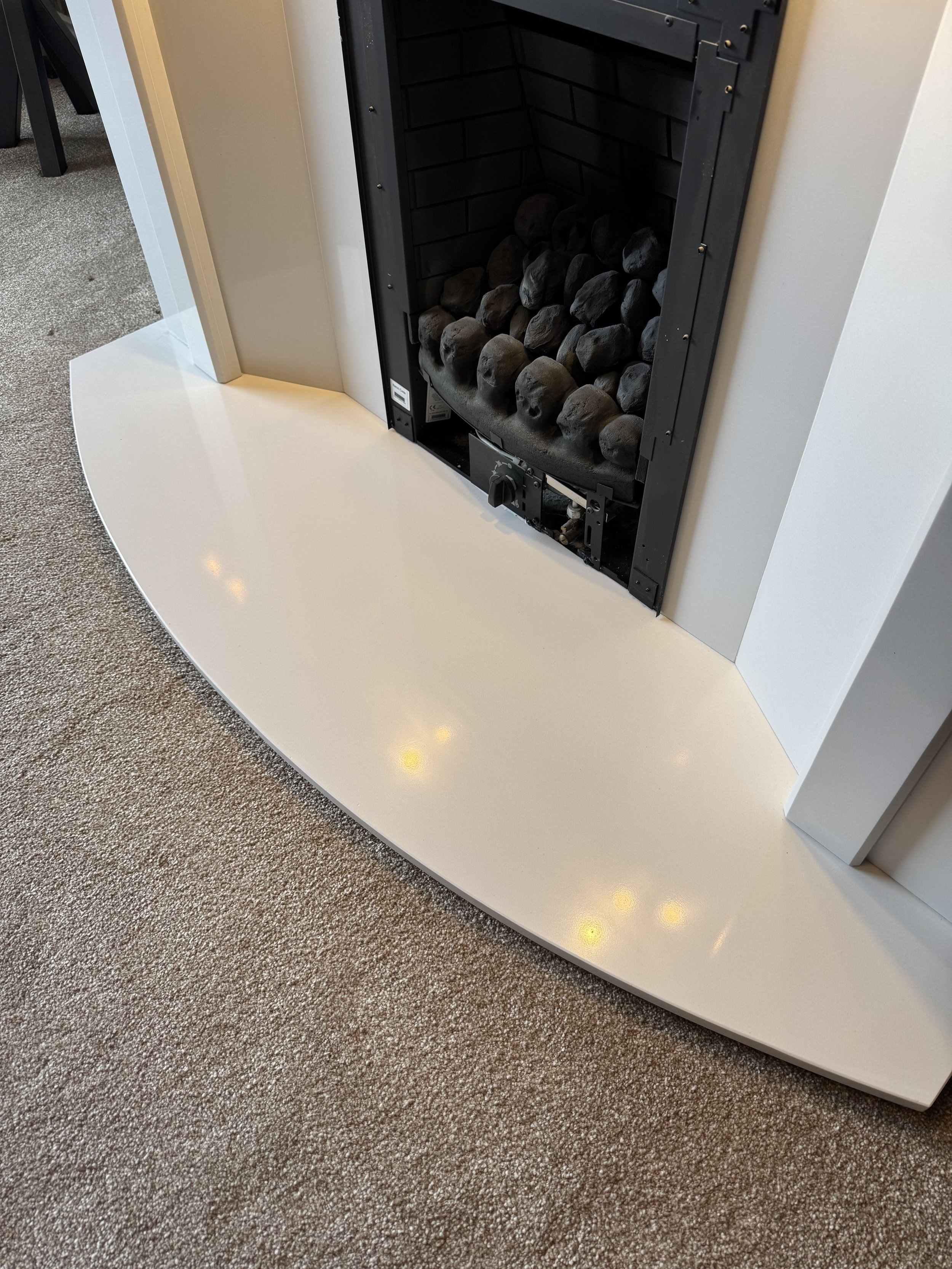 Polished marble fireplace hearth after professional marble restoration in Clitheroe