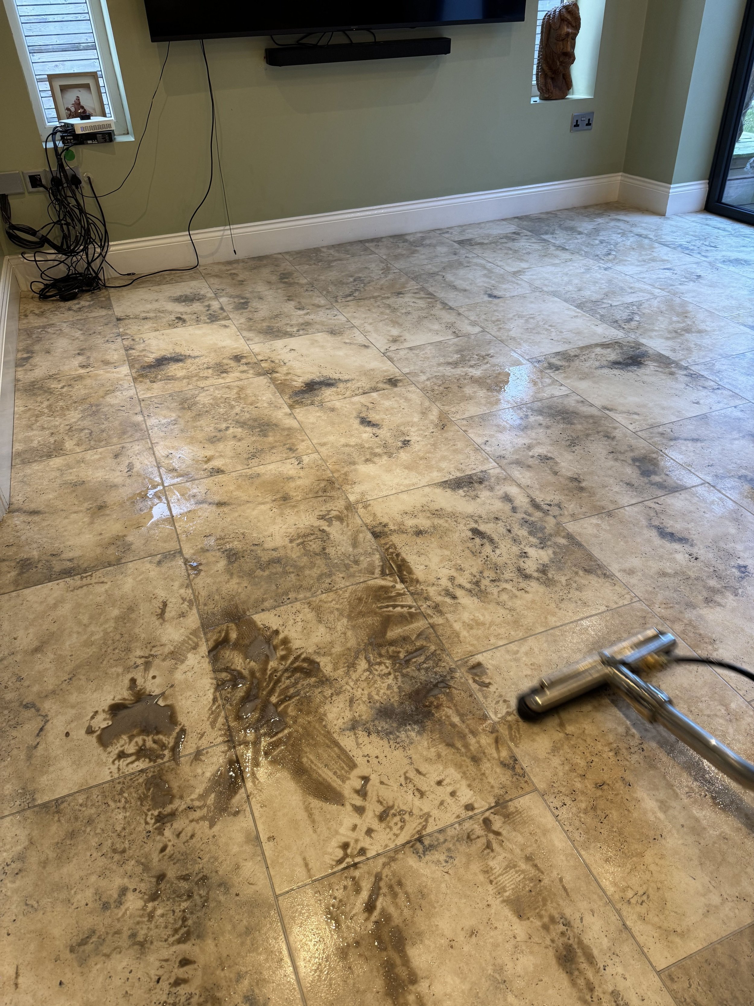 Tile and grout cleaning during process in Clitheroe home.